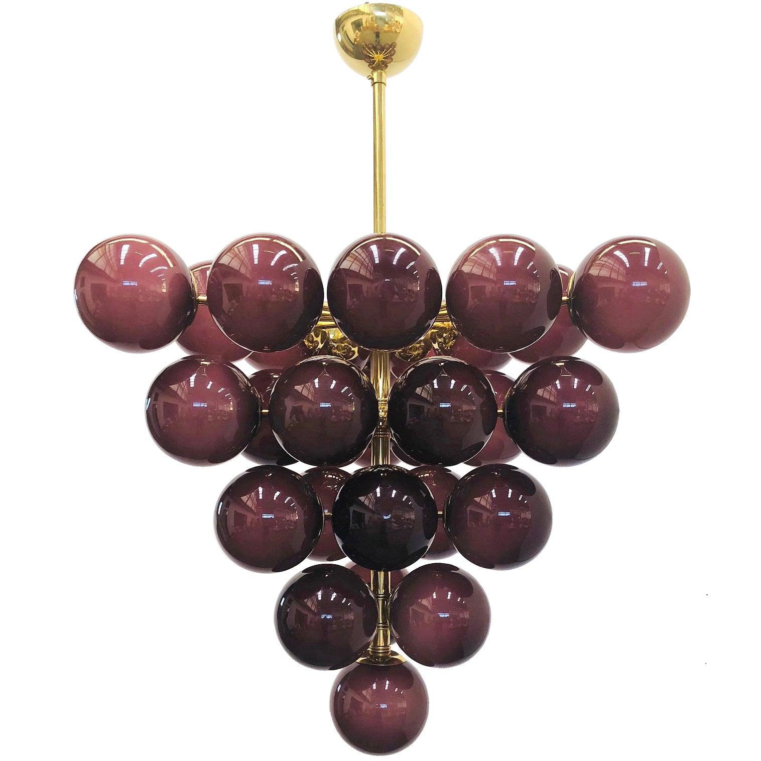 Italian chandelier with Amethyst Murano glass globes mounted on polished brass frame / Designed by Fabio Bergomi for Fabio Ltd / Made in Italy
31 lights / E12 or E14 type / max 40W each
Measures: Diameter 31.5 inches / height 31.5 inches not