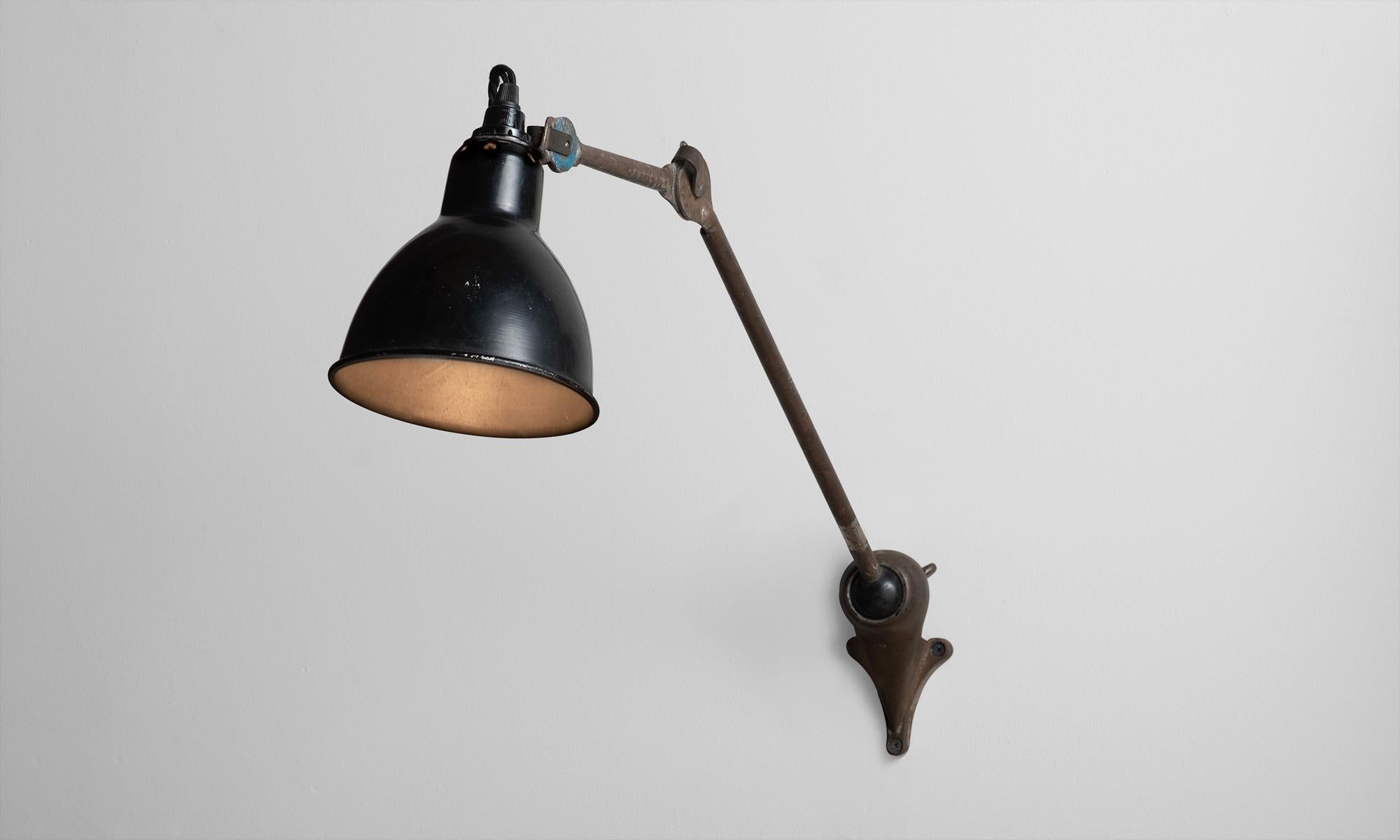 Gras lamp model 202, France, circa 1930.

Designed by Bernard-Albin Gras, with iron base, bakelite ball-joint and remnants of original paint.