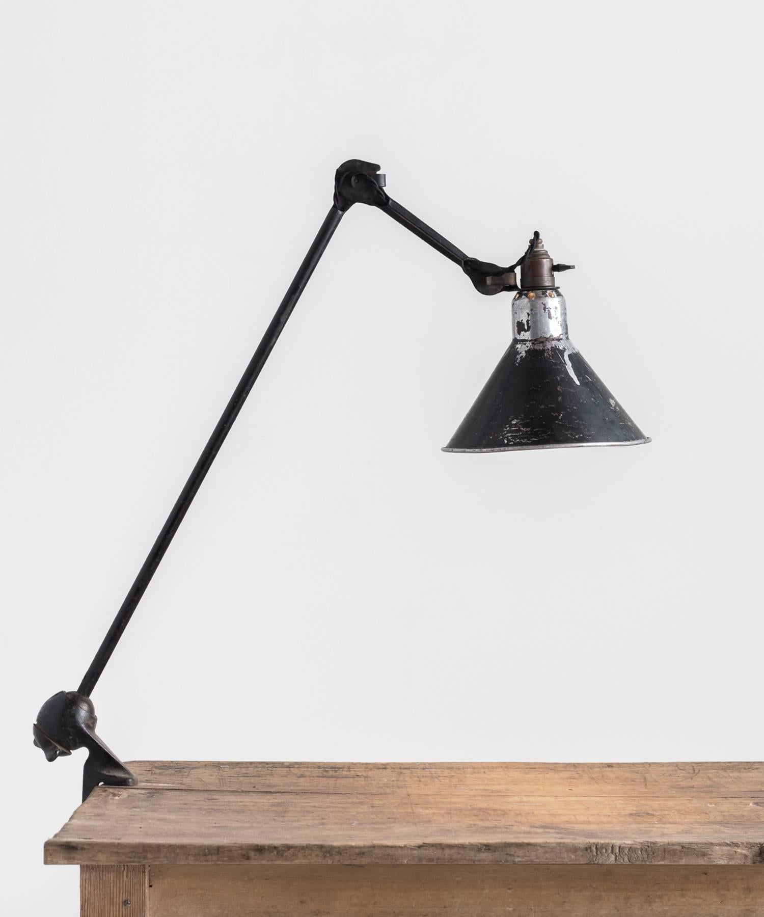 Gras Lamp No. 201, circa 1930

Industrial clamp-on desk lamp with amazing patina includes three points of adjustment, designed by Berard-Albin Gras. 

Measures: 8.25