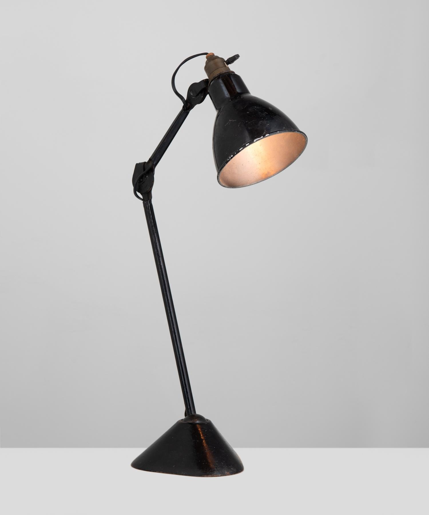 Gras lamp no. 205, circa 1930.

Iconic design by Bernard-Albin Gras features a cast steel frame with three points of adjustment. Measurement from configuration shown in cover image.

Measures: 14.5