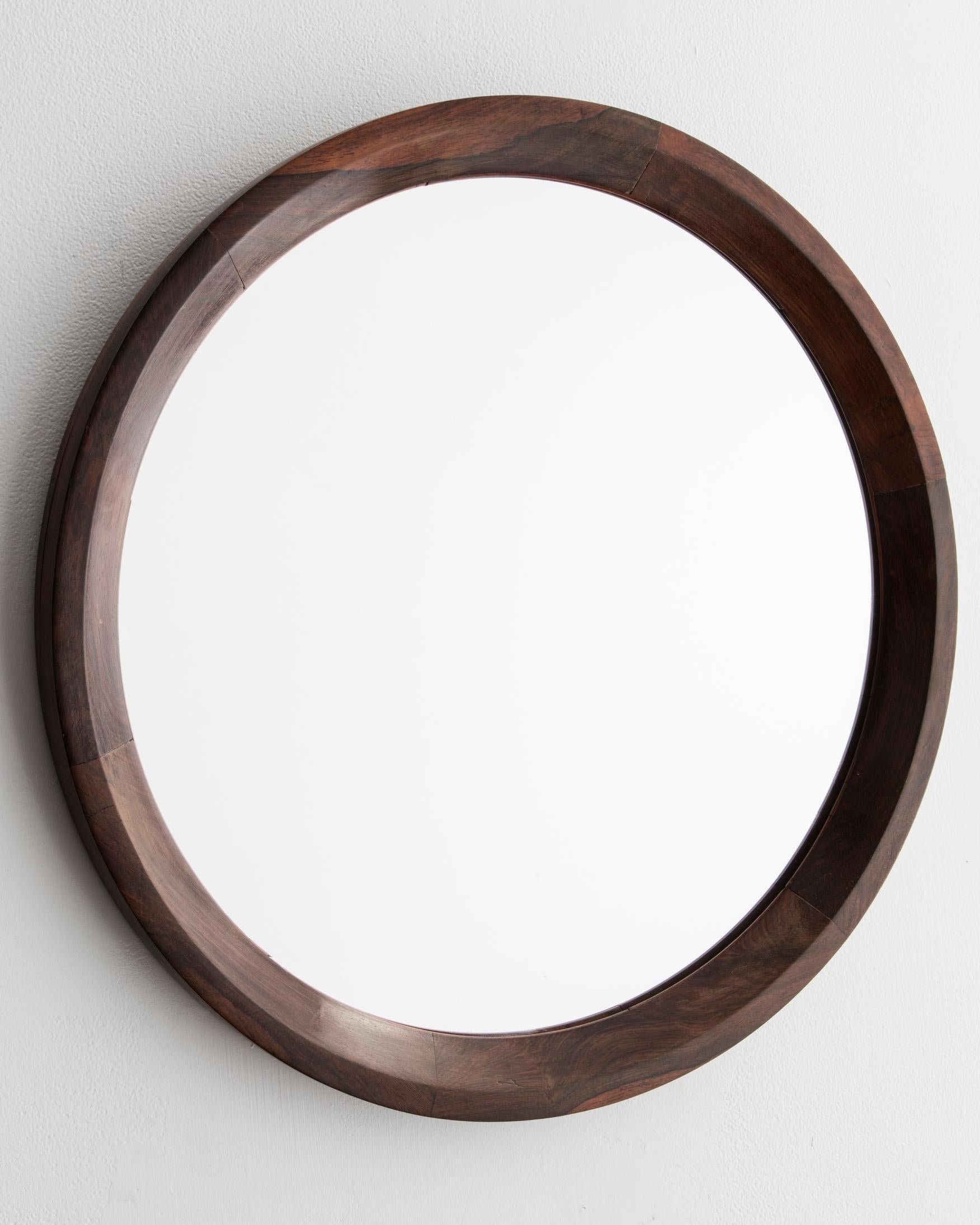 Round Grasselli mirror with wood frame. Designed by Sergio Rodrigues, Brazil, circa 1960.
           