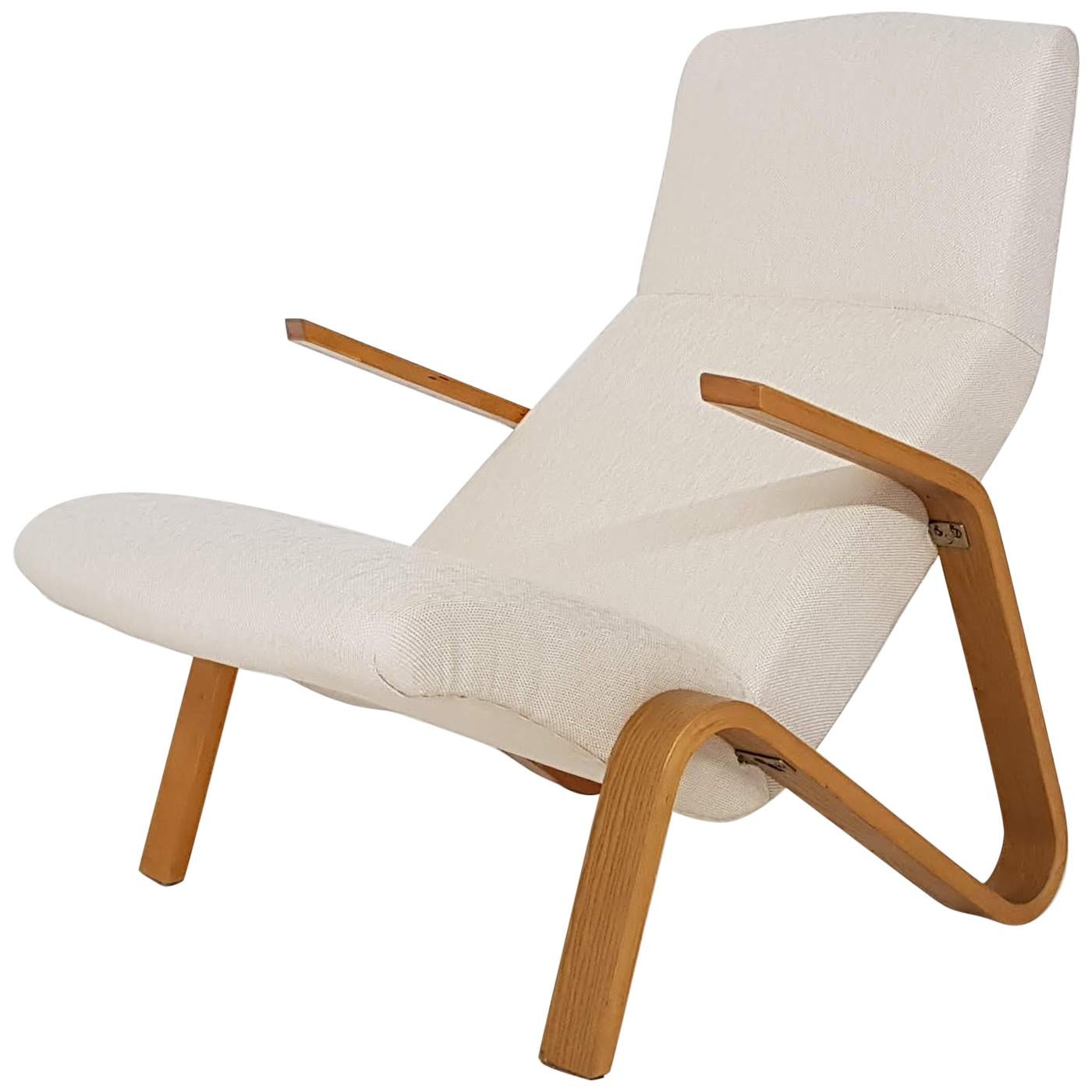 Beautiful original lounge chair with bentwood birch frame and new white teddy upholstery and filling by Eero Saarinen for Knoll Associates.

Eero Saarinen is one of the most iconic and recognized designers from the mid-century. He was a