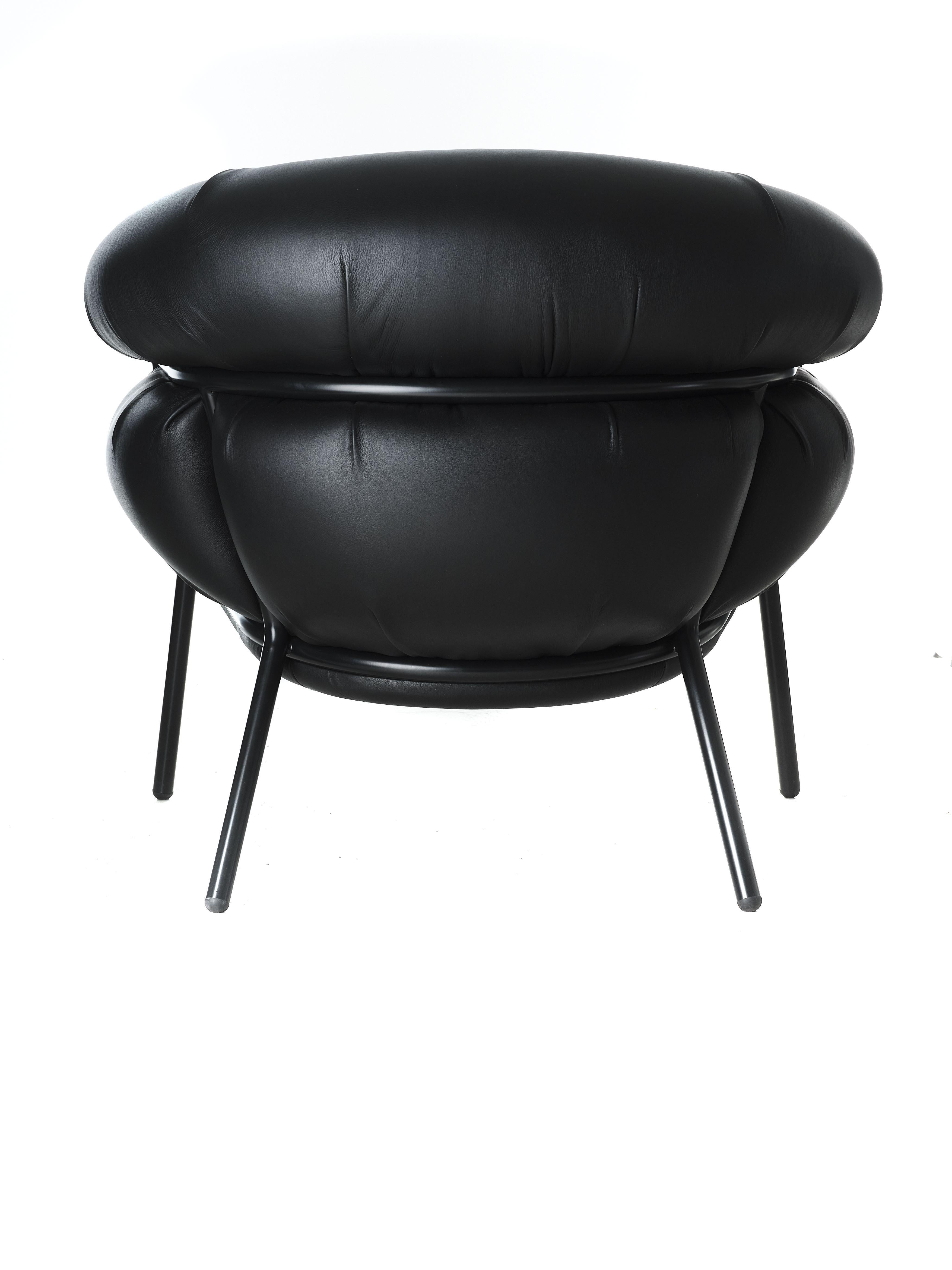 Spanish Grasso Armchair by Stephen Burks black padded leather upholstery black structure For Sale