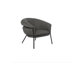 Grasso Sessel von Stephen Burks: Modernes Design aus Stoff und Eisen