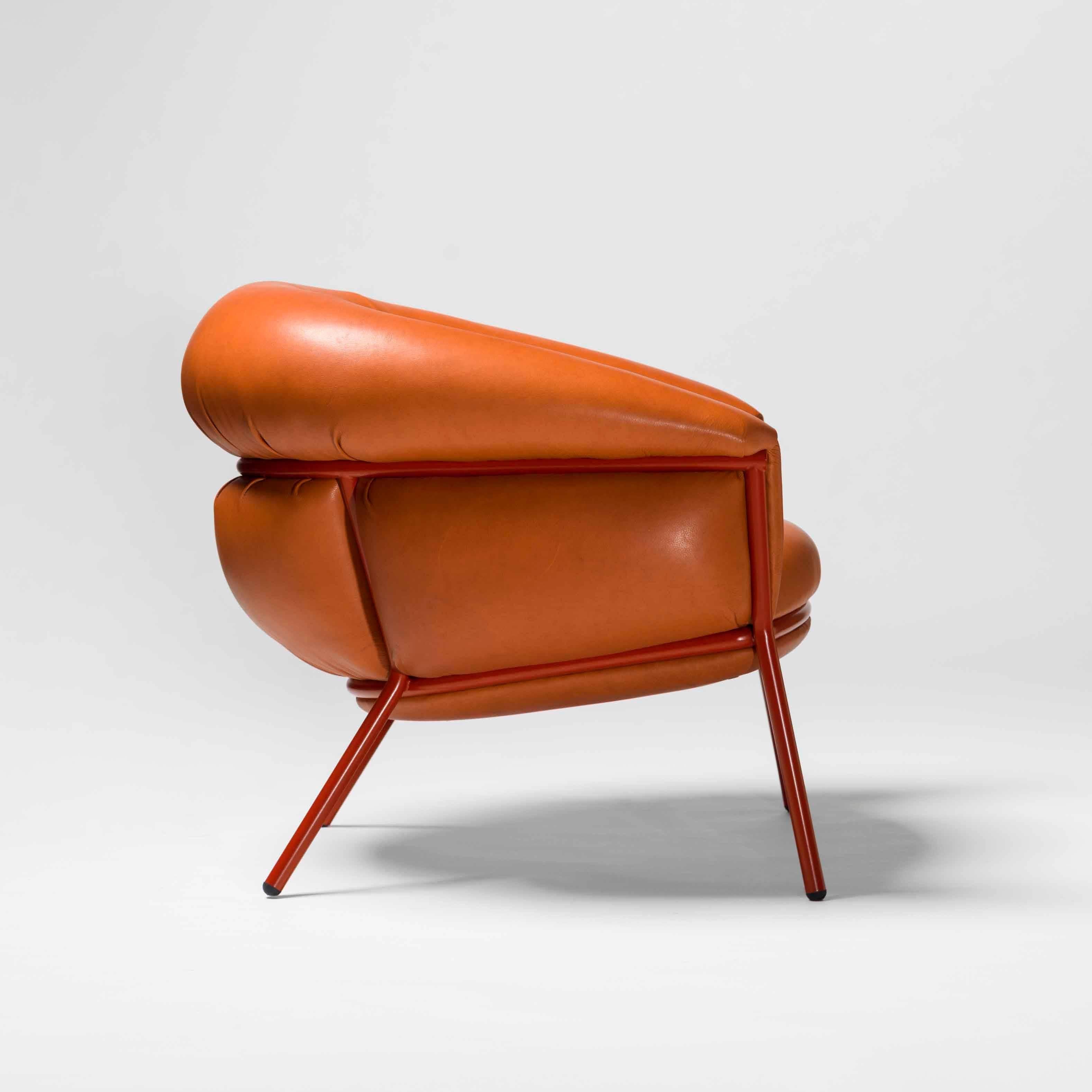 Armchair designed by Stephen Bruks manufactured by BD Barcelona.

An iron tubular (25mm) structured armchair. Seat and backrest upholstered in leather.

We have the possibility in different colors.

The leather upholstery oozes over the bare