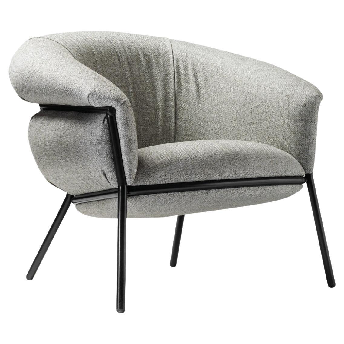 Grasso Armchair by Stephen Burks padded grey curved upholstery black structure For Sale