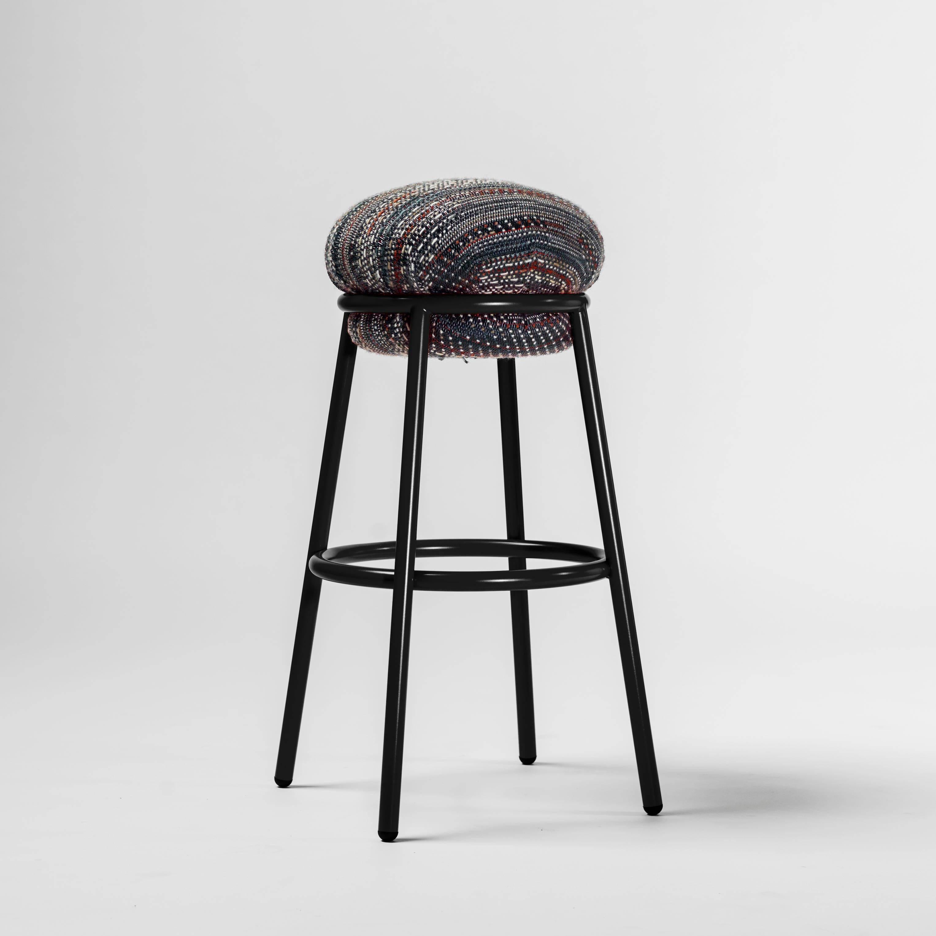 Bar Stool designed by Stephen Burks manufactured by BD

An iron tubular (25mm) structured armchair. Seat and backrest upholstered in fabric.

The fabric upholstery oozes over the bare iron structure. 

Measure: Ø36 x H 80 cm

Year: 2018.