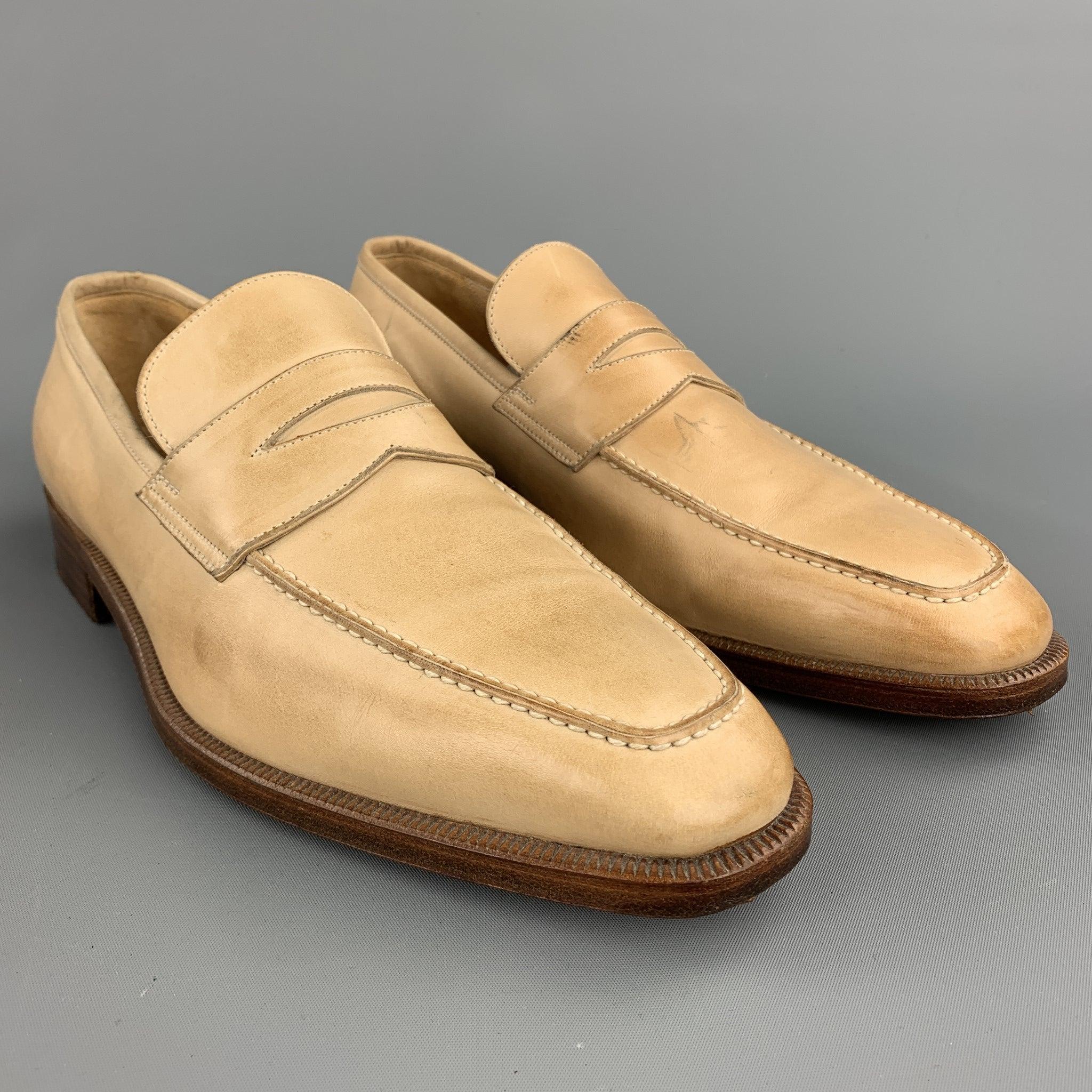 GRAVATI per WILSON and DEAN for WILKES BASHFORD loafers comes in a natural leather featuring a penny strap, contrast stitching, and a wooden sole. Wear throughout. Made in Italy.Very Good
Pre-Owned Condition. 

Marked:   8.5 MOutsole:11.5 inches  x