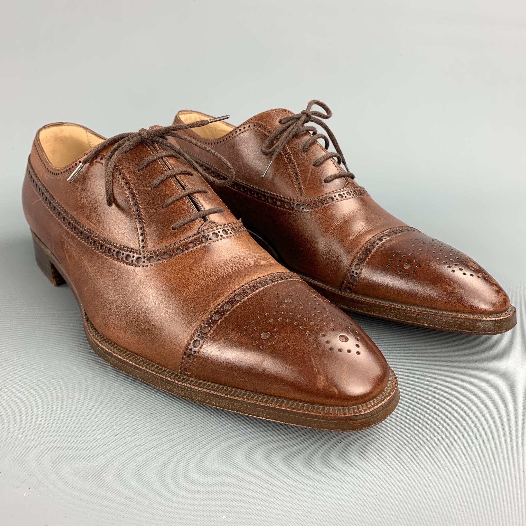 GRAVATI per WILSON AND DEAN for WILKES BASHFORD lace up shoes comes in a brown perforated leather featuring a cap toe and a wooden sole. Made in Italy.

Excellent Pre-Owned Condition.
Marked: UK 8.5 M

Outsole:

12 in. x 4 in. 