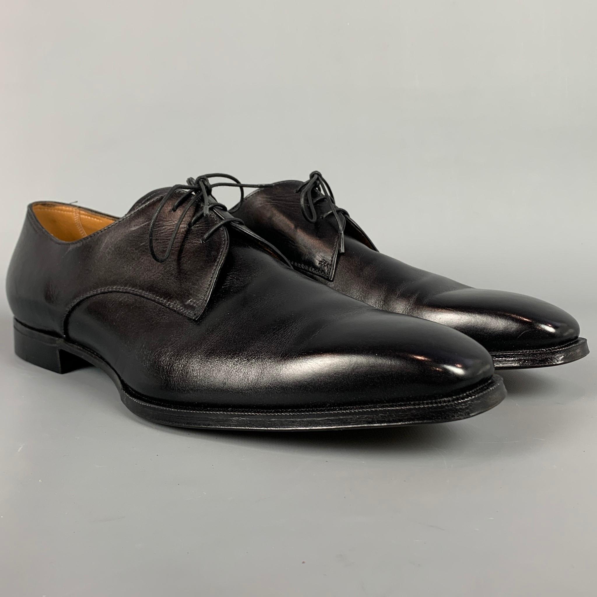 GRAVATI dress shoes comes in a black leather featuring a square toe, wooden sole, and a lace up closure. Made in Italy.  

New With Box. 
Marked: 18451 12.5M 750
Original Retail Price: $655.00

Outsole: 13 in. x 4 in. 