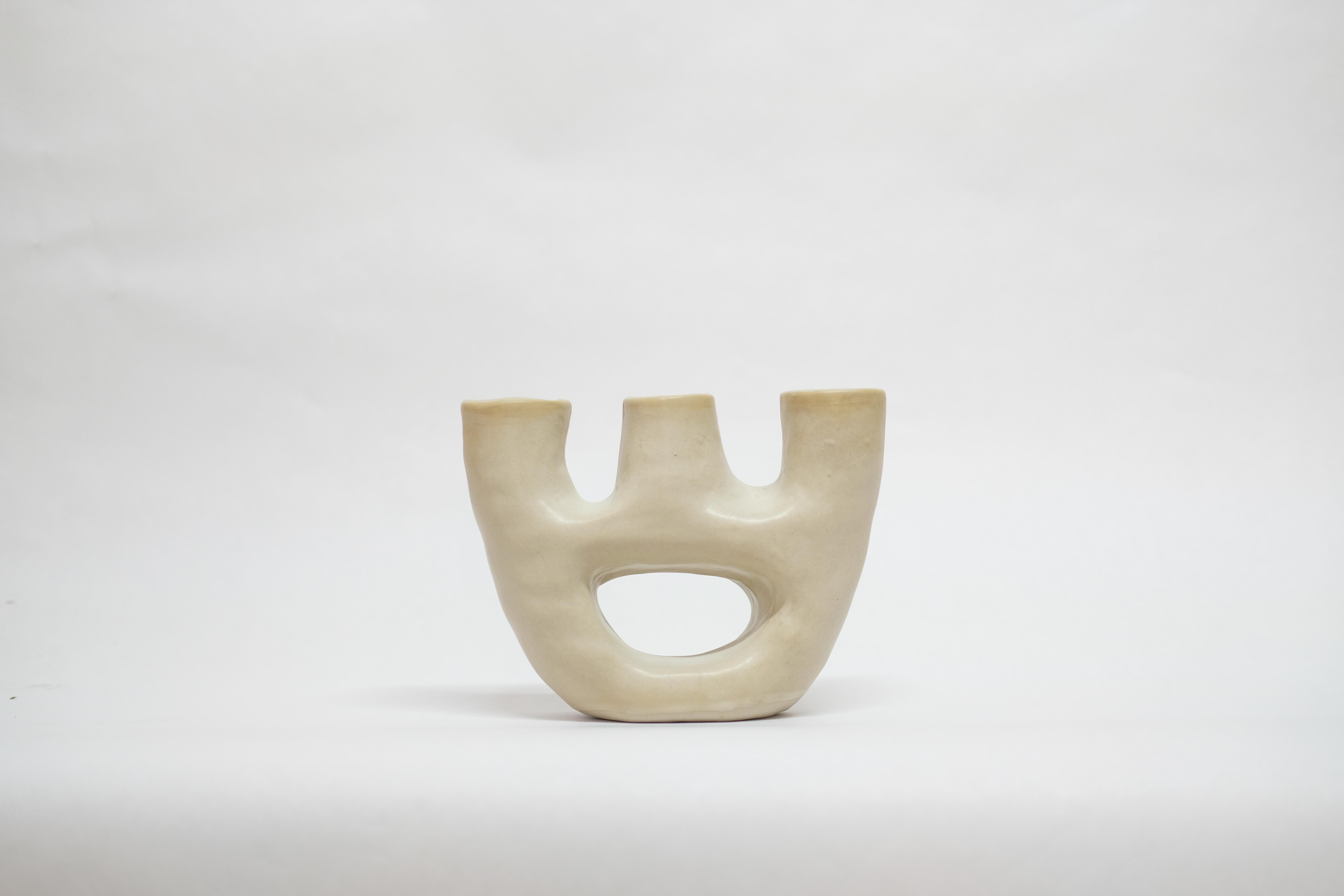 Gravedad stoneware vase by Camila Apaez
One of a kind
Materials: Stoneware
Dimensions: 16 x 15 x 6 cm
Options: White bone, butter milk

This year has been shaped by the topographies of our homes and the uncertainty of our time. We have found solace