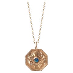 Gravitational Pull Blue Sapphire Charm in 14K Gold by Anastassia Sel Jewelry