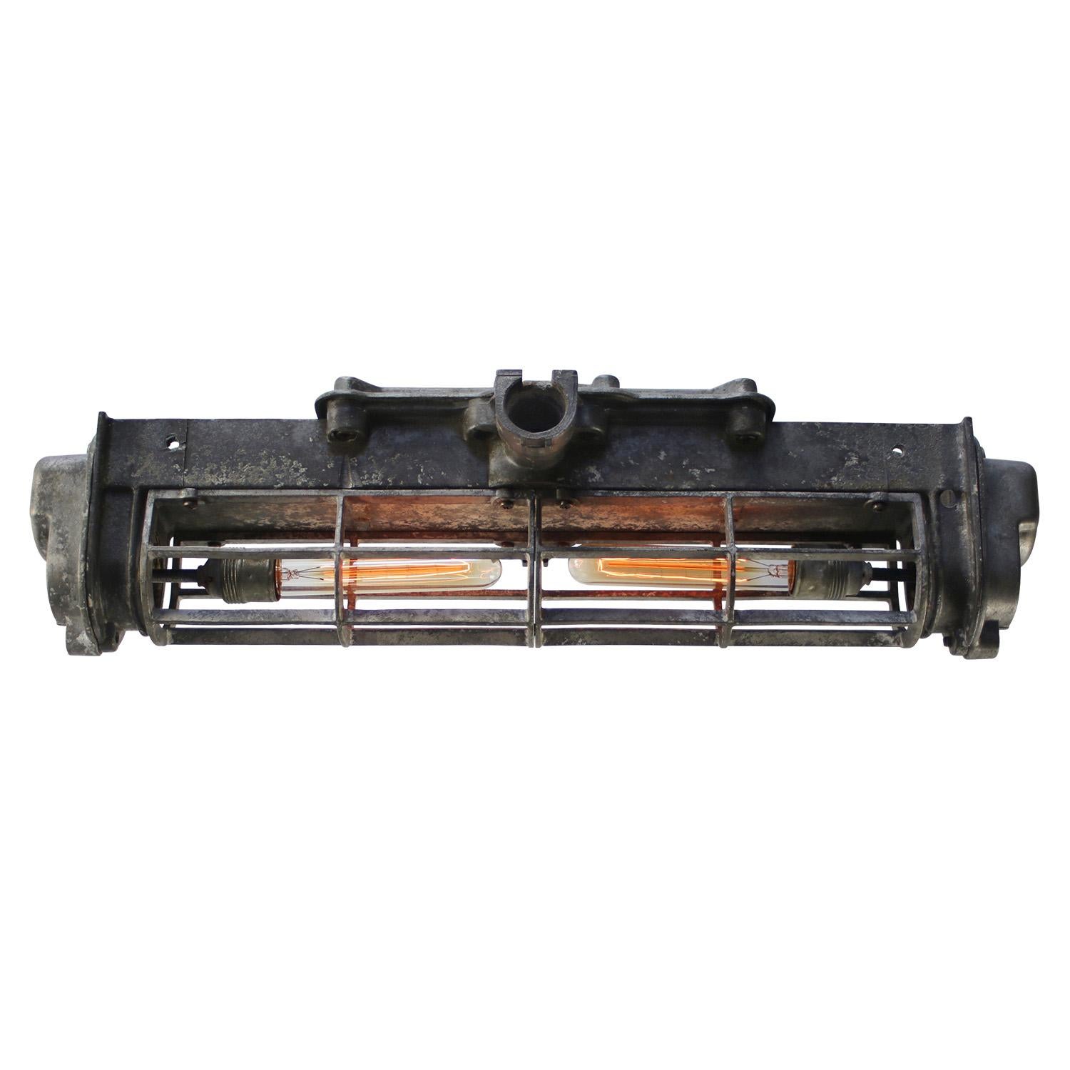France CAEC R.M.A 1948
Industrial cast aluminium light.

Measures: 8.60 kg / 19 lb

Priced per individual item. All lamps have been made suitable by international standards for incandescent light bulbs, energy-efficient and LED bulbs. E26/E27 bulb