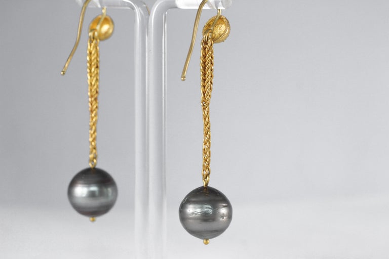 Midnight Pearls Earrings. Simple, elegant dangle drop earrings. An antiquities twist on a minimal modern design. Easy to wear, easy to match, for any occasion.

Inspired by the manual techniques of jewelry making, chain weaving was introduced by