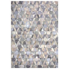 Alfombra de piel de vaca y viscosa Selva gris y caramelo