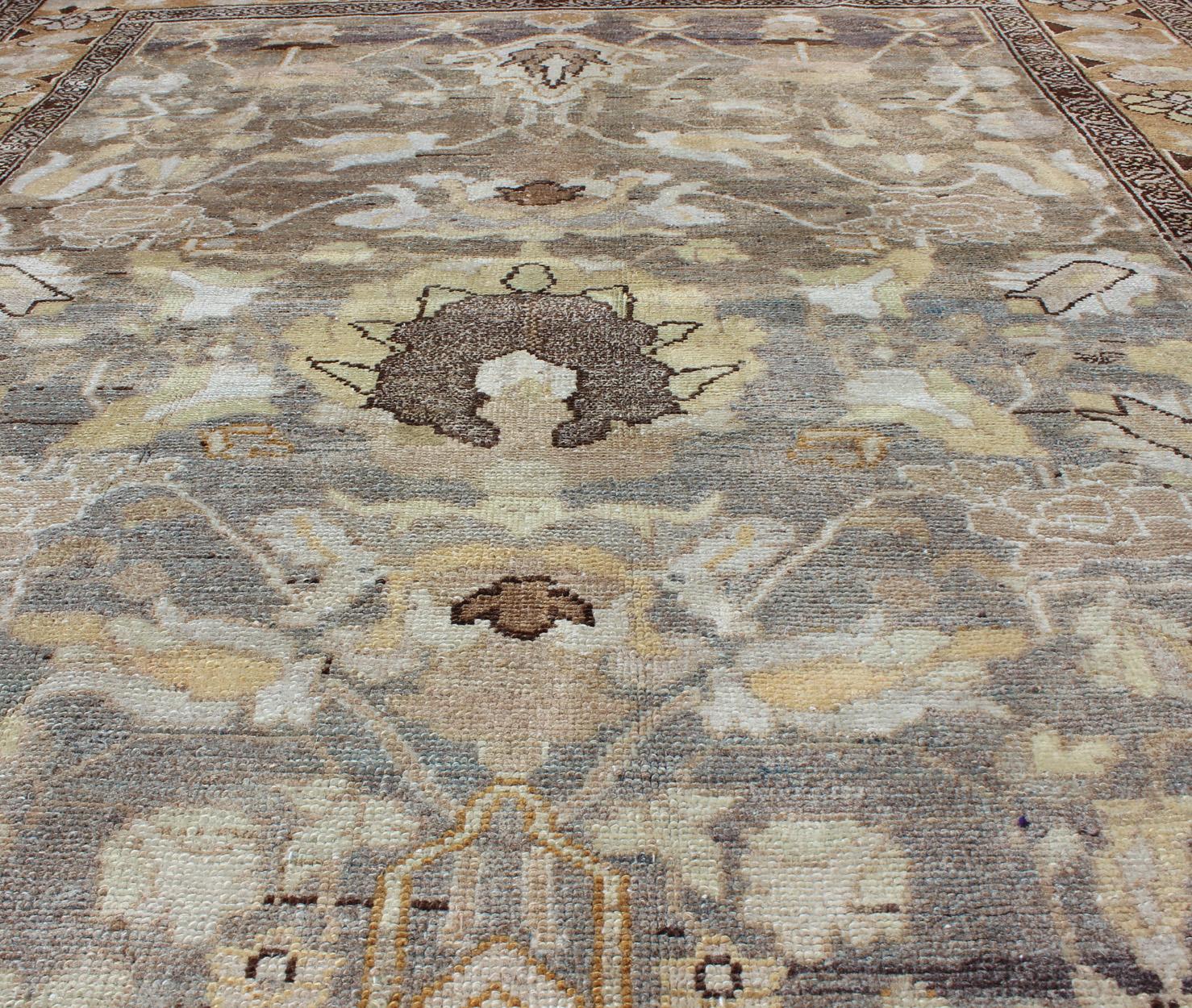 Early 20th Century Gray and Marigold Antique Persian Bakhtiari Rug with Expansive Floral Design For Sale