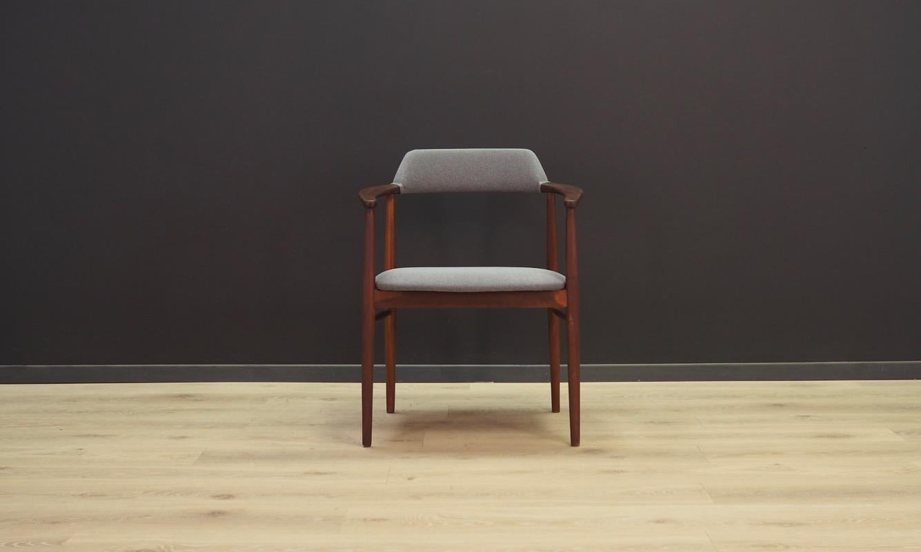 Classic armchair from the 1960s-1970s, beautiful minimalistic form, Scandinavian design. New upholstery (color-grey), construction made of teak wood. Maintained in good condition (minor scratches and bruises on the wooden structure visible),