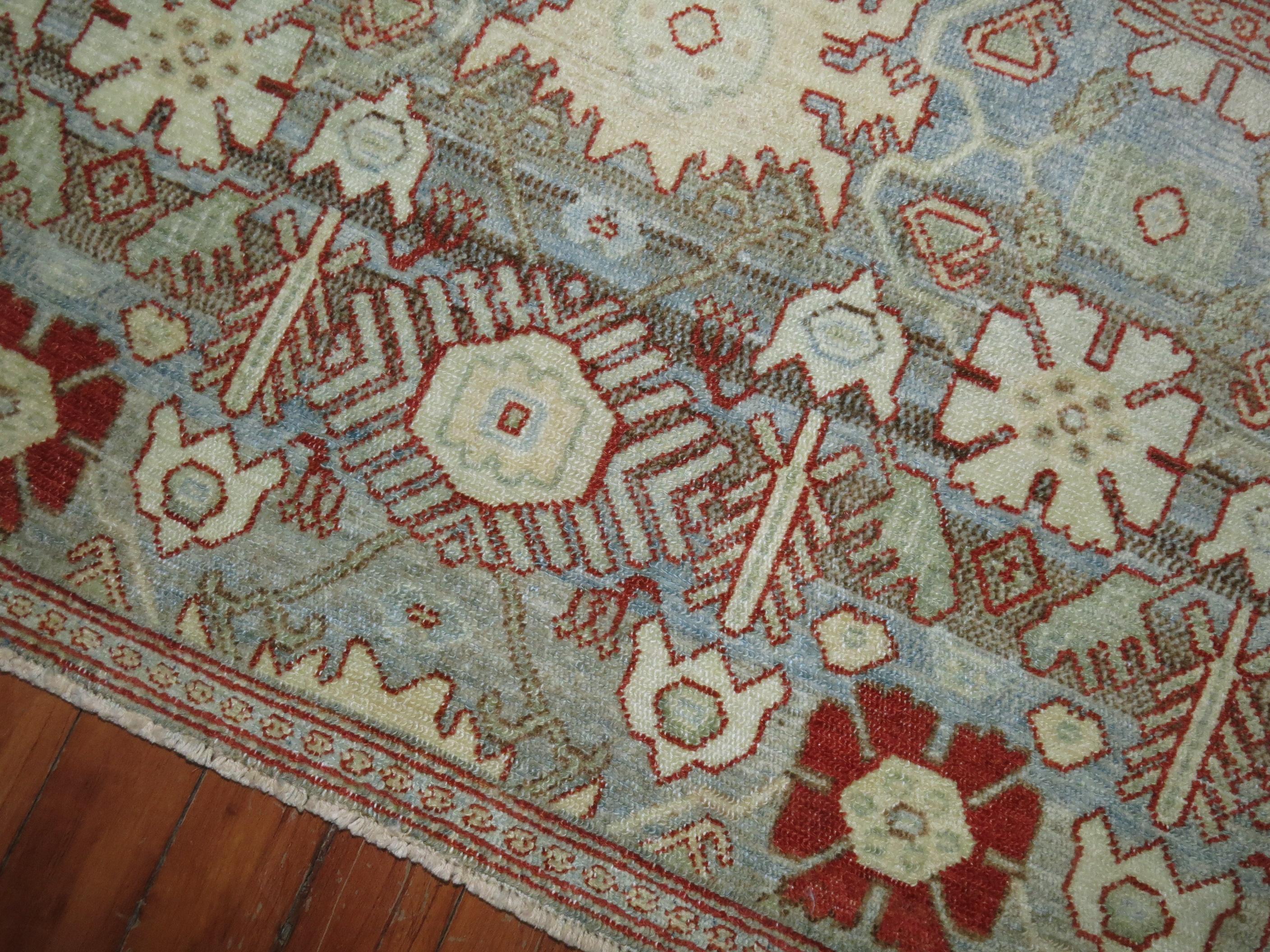 Gray, light blue, brow, hint of red 20th century Persian Senneh mat size rug.

Measures: 1'7