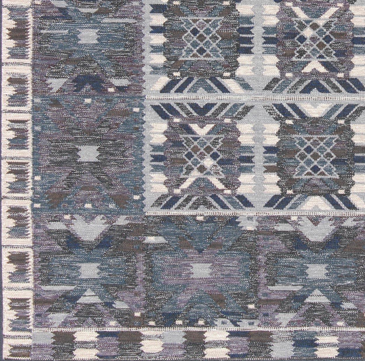 Gray, blue and charcoal Scandinavian flat-weave rug with modern design, rug rjk-16215-shb-001-09, country of origin / type: Scandinavia / Scandinavian Modern

This modern Scandinavian design flat-weave rug is inspired by the work of Swedish textile