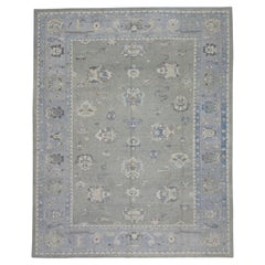 Tapis turc Oushak en laine à motifs floraux gris et bleus tissé à la main 8'10" X 11'10"