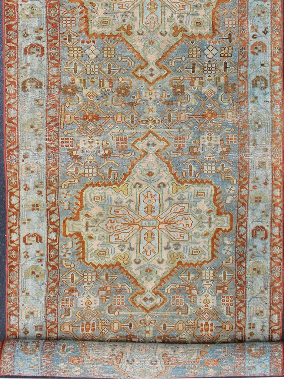 Colorful Floral Geometric Persian Malayer antique runner with vertical medallions, rug SUS-2007-307, country of origin / type: Iran / Malayer, circa 1920.

This antique Persian Malayer runner, circa early 20th century, relies heavily on exquisite