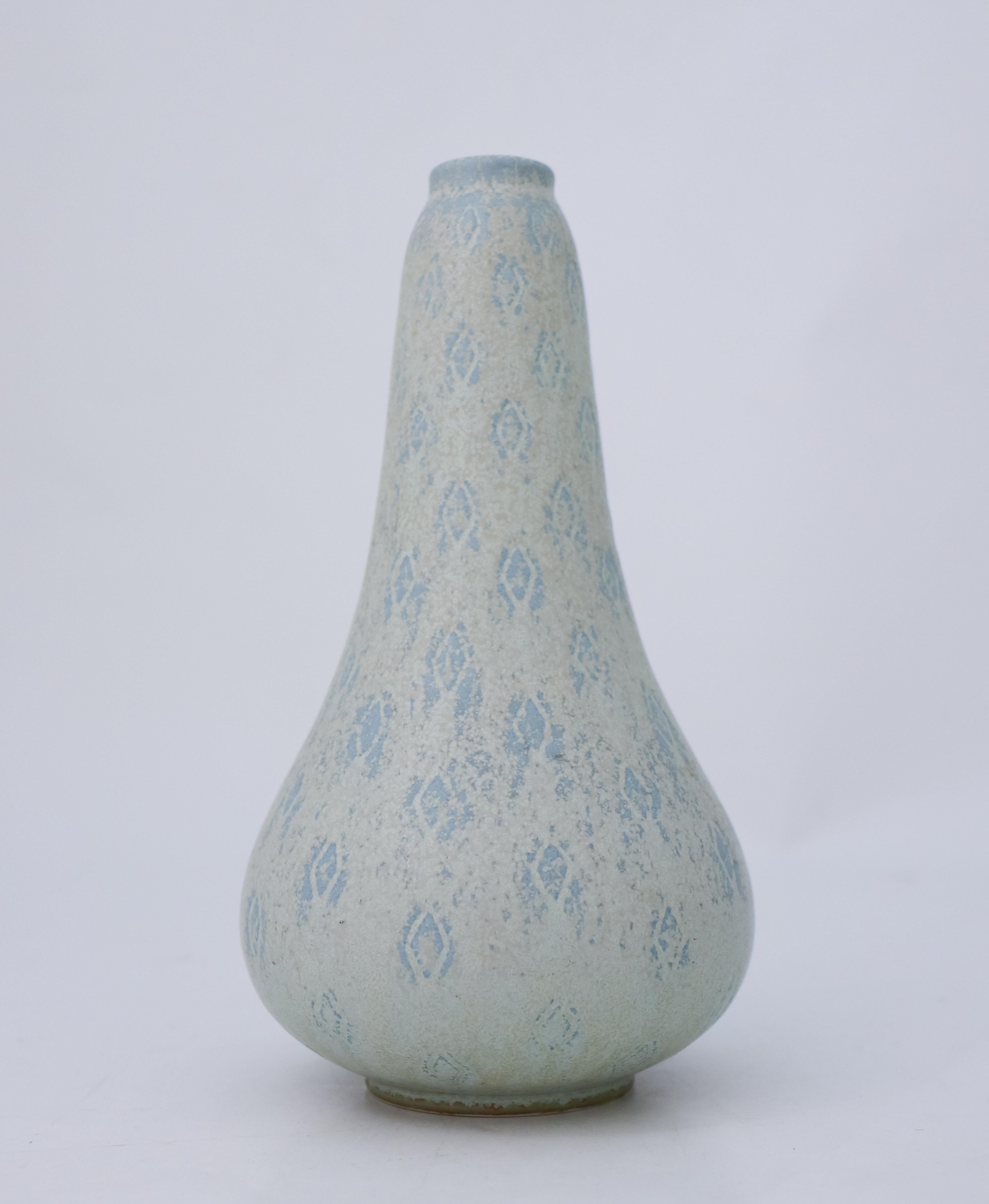 A gray and blue vase designed by Gunnar Nylund at Rörstrand, the vase is 20 cm (8