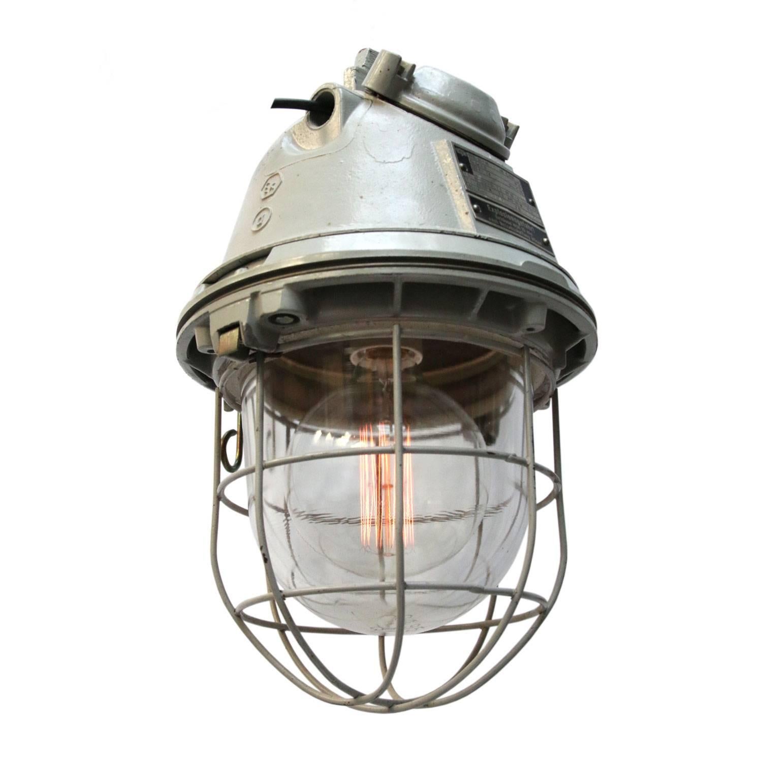 Industrial hanging lamp. Grey cast aluminium.
Clear glass.

Weight: 7.9 kg / 17.4 lb

Priced individual item. All lamps have been made suitable by international standards for incandescent light bulbs, energy-efficient and LED bulbs. E26/E27 bulb