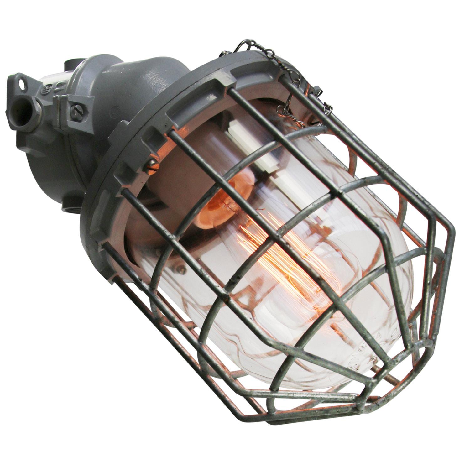 Dutch industrial wall lamp made by Industria Rotterdam
Grey aluminium with clear glass

Weight: 2.20 kg / 4.9 lb

Priced per individual item. All lamps have been made suitable by international standards for incandescent light bulbs,