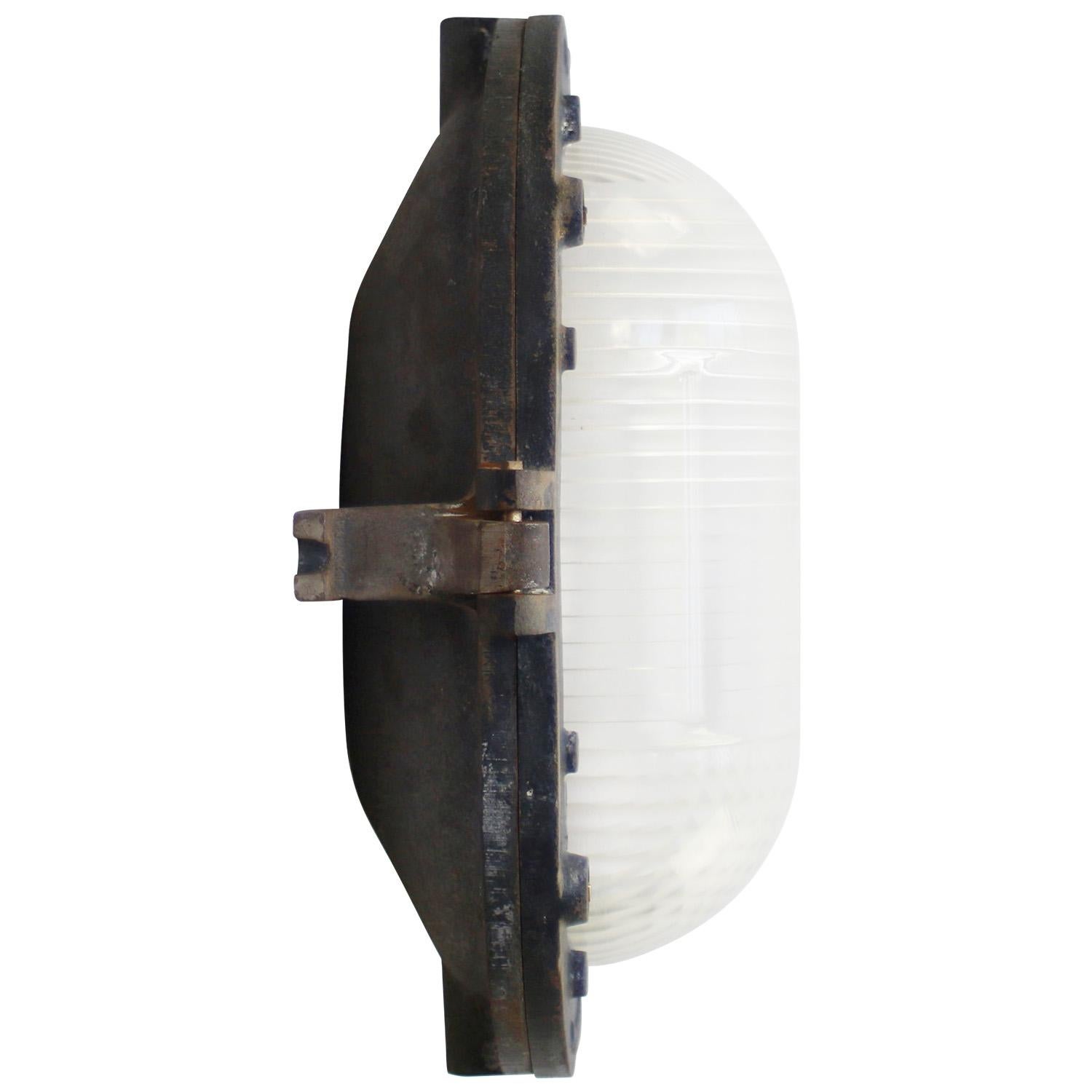 Gray Cast Iron Frosted Cut Glass Sconce by Holophane, France In Good Condition For Sale In Amsterdam, NL