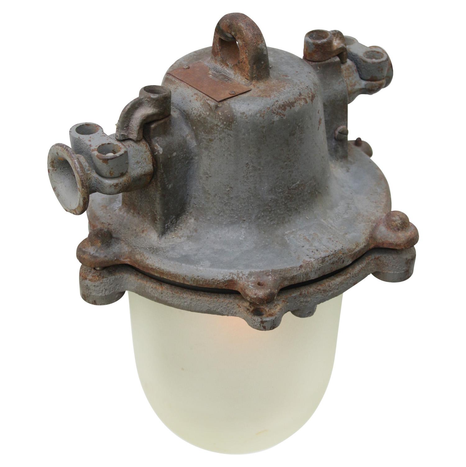 Industrial lamp
Grey cast iron with greenish frosted glass

Weight 8.00 kg / 17.6 lb

Priced per individual item. All lamps have been made suitable by international standards for incandescent light bulbs, energy-efficient and LED bulbs. E26/E27