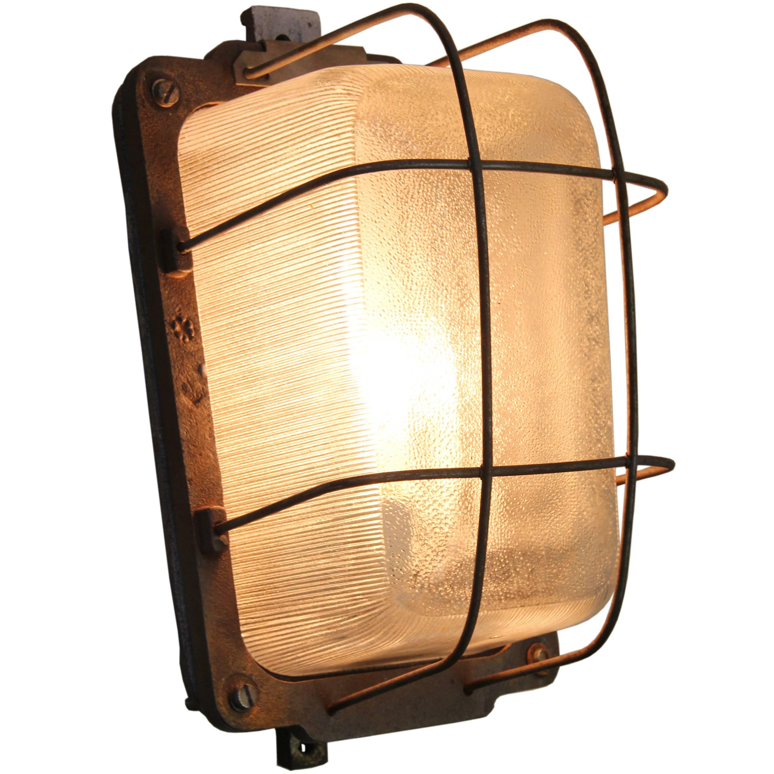 Wall lamp Sconce made of cast iron with clear striped glass
suitable for outdoor use

Weight 7.0 kg / 15.4 lb

Priced per individual item. All lamps have been made suitable by international standards for incandescent light bulbs, energy-efficient