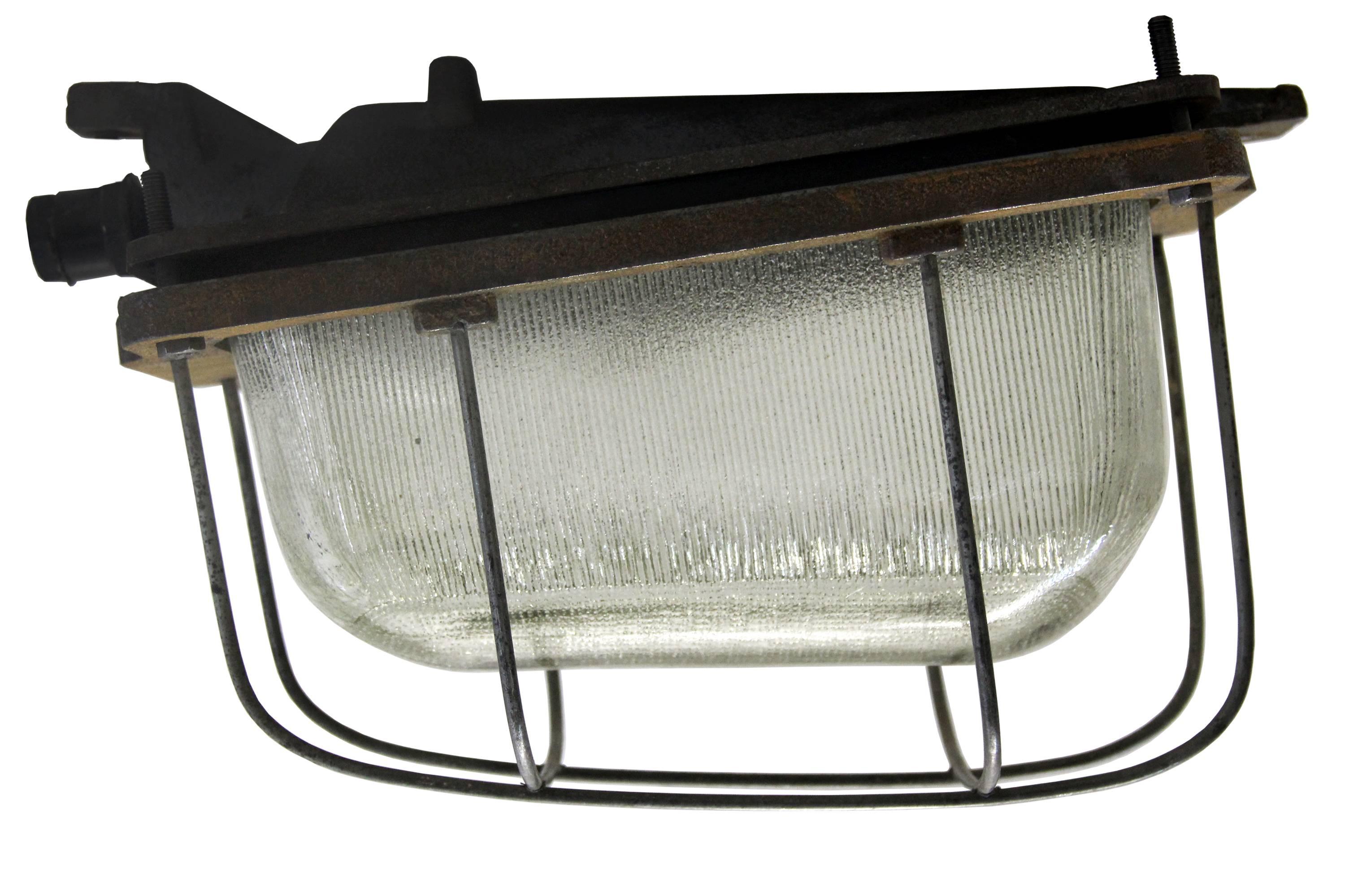 XX secolo Gray Cast Iron Vintage Industrial Holophane Glass Wall Lamp Sconce in vendita