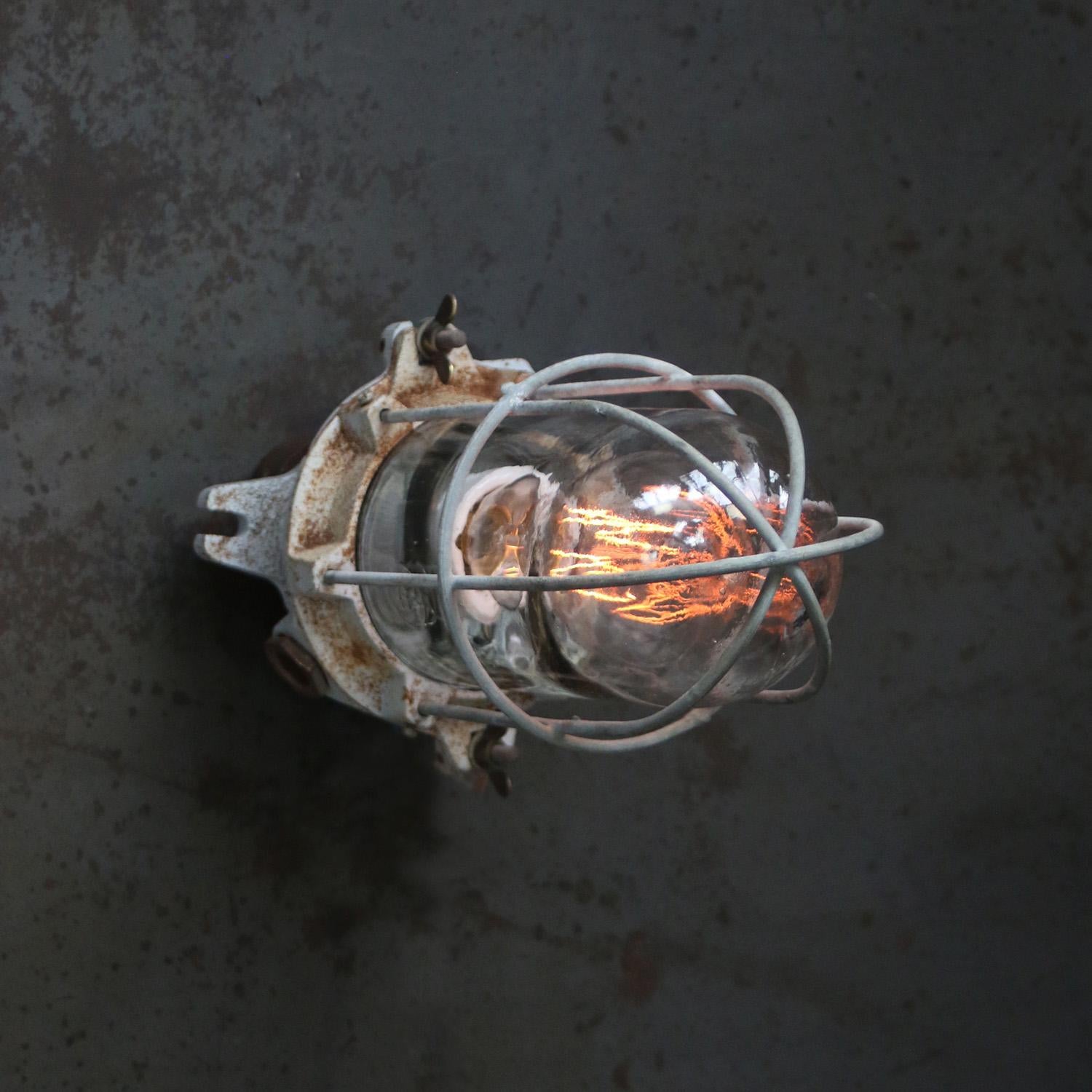 Industria Rotterdam industrial cage light
Gray cast iron with clear glass

Weight: 2.40 kg / 5.3 lb

Priced per individual item. All lamps have been made suitable by international standards for incandescent light bulbs, energy-efficient and LED