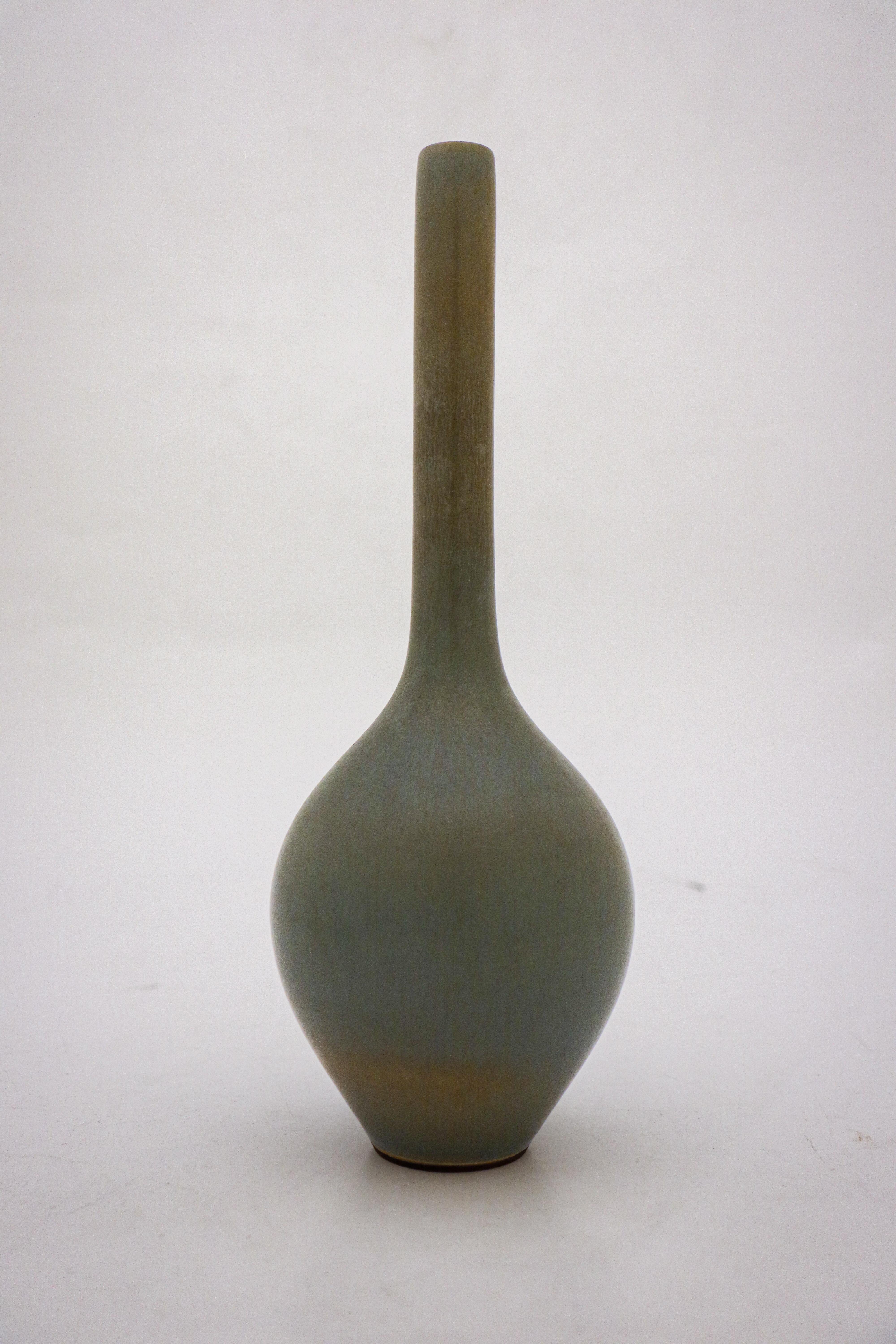A lovely vase with a gray har fur glaze designed by Berndt Friberg at Gustavsberg in Stockholm, the vase is 25.5 cm high. It's marked as on picture and was made in 1956. It is in excellent condition.