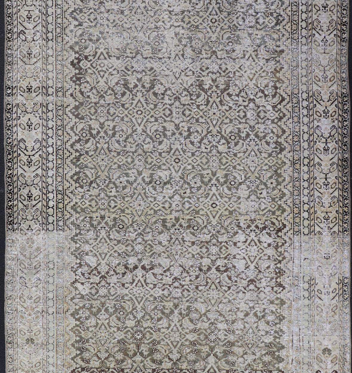 All-over Herati motif design Persian distressed antique Malayer Gallery rug in tones of gray, charcoal and neutrals rug SUS-2012-272, country of origin / type: Iran / Malayer, circa 1910.

This beautiful distressed antique early 20th century