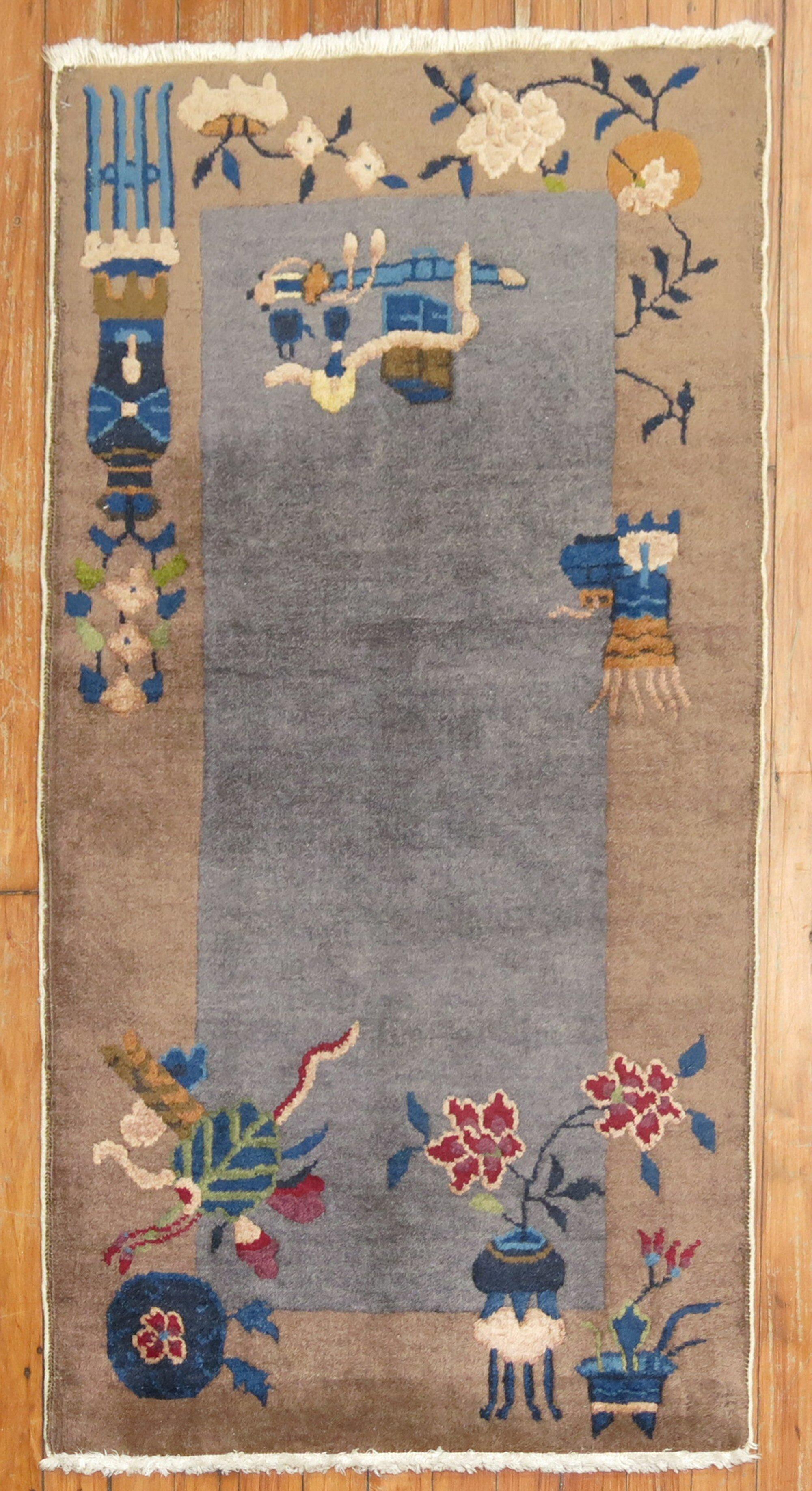 Scatter size Gray Chinese Art Deco rug.

Measures: 2'1'' x 4'

Chinese Art Deco rugs are known for their striking mix of asymmetrical patterns, vibrant colors, and traditional motifs, which are is bold, beautiful, and quite rare. Woven between