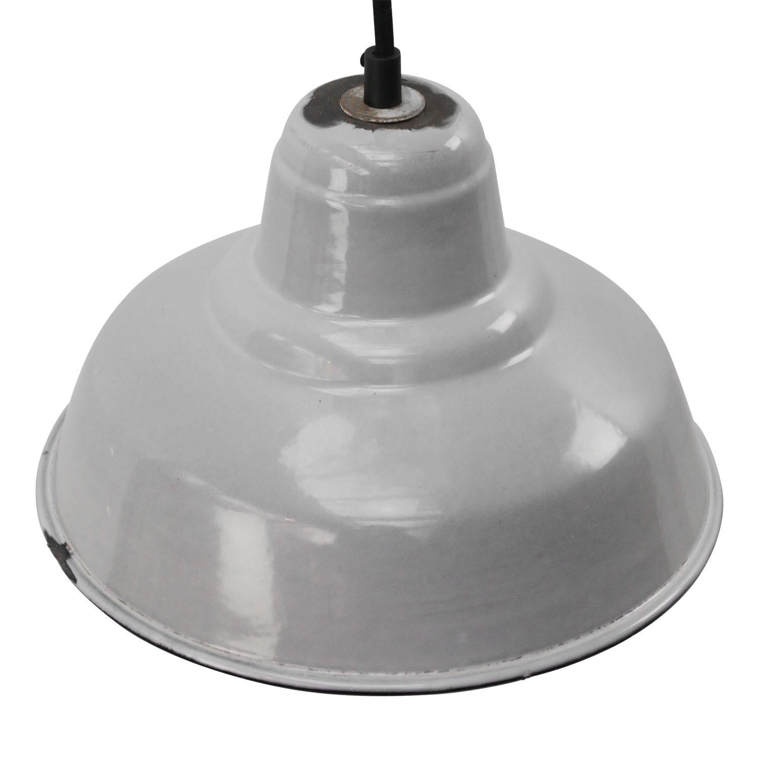 Dutch Industrial hanging lamp. Gray enamel white interior.

Weight: 0.95 kg / 2.1 lb

Priced per individual item. All lamps have been made suitable by international standards for incandescent light bulbs, energy-efficient and LED bulbs. E26/E27
