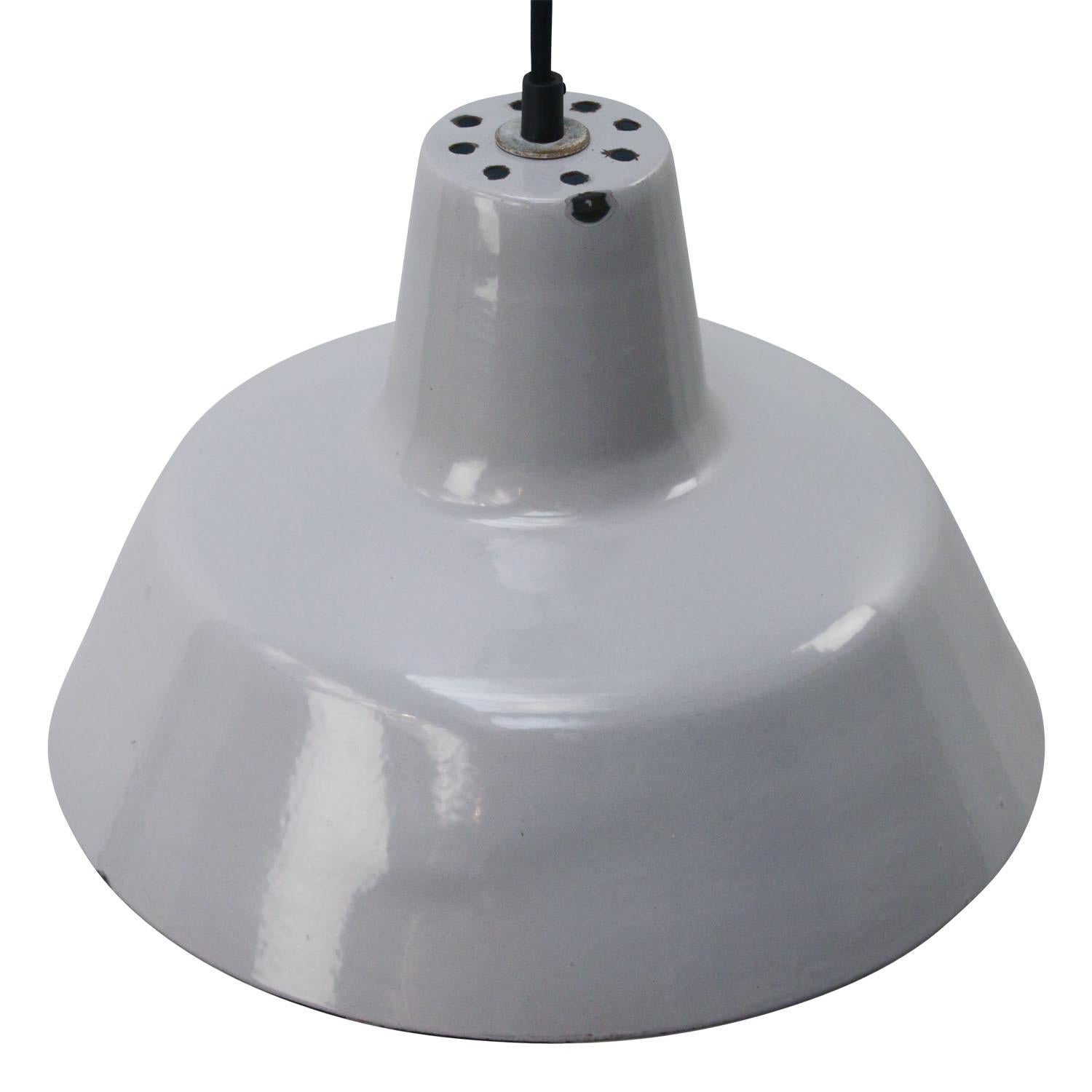 Dutch industrial hanging lamp by Philips
grey enamel white interior

Weight: 1.50 kg / 3.3 lb

Priced per individual item. All lamps have been made suitable by international standards for incandescent light bulbs, energy-efficient and LED