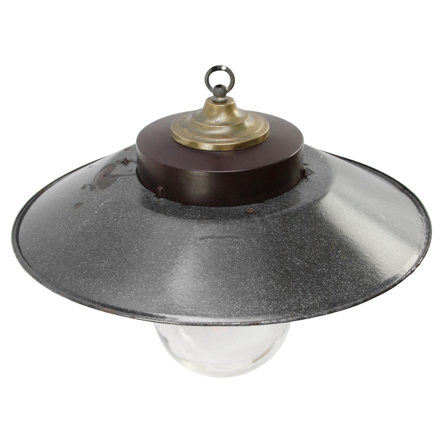 Industrial pendant light. Grey enamel white interior. Bakelite with brass top. Clear glass.

Weight: 3.20 kg / 7.1 lb

Priced per individual item. All lamps have been made suitable by international standards for incandescent light bulbs,