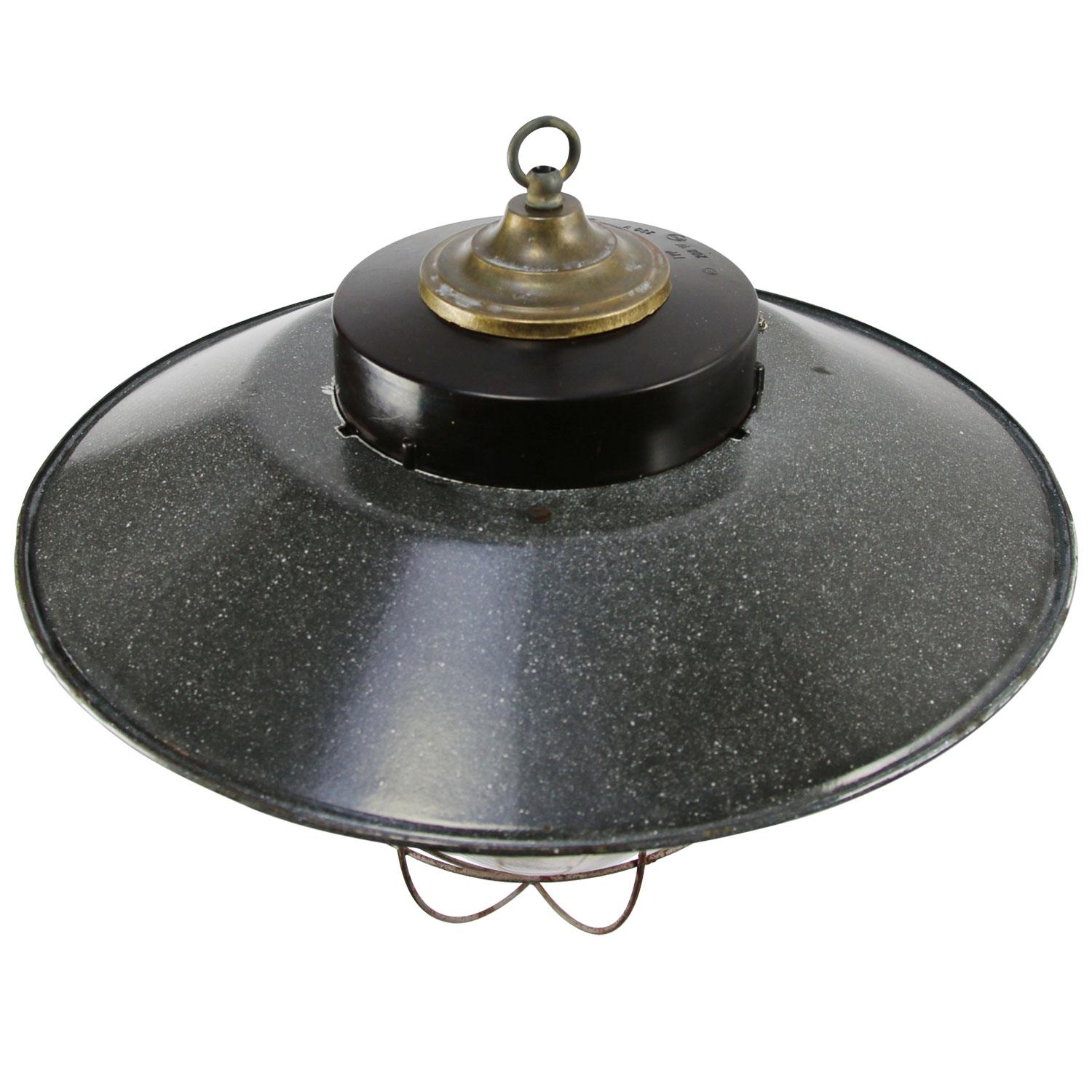 Industrial pendant light. Grey enamel white interior. Bakelite with brass top. Clear glass and cage.

Weight: 3.20 kg / 7.1 lb

Priced per individual item. All lamps have been made suitable by international standards for incandescent light