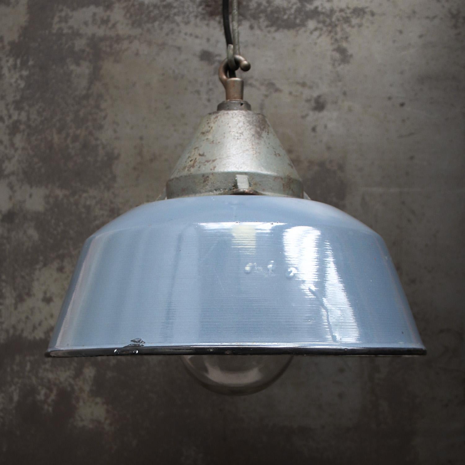 Factory hanging lamp
Gray enamel white interior
clear glass, cast iron top

Weight 5.5 kg / 12.1 lb

Priced per individual item. All lamps have been made suitable by international standards for incandescent light bulbs, energy-efficient and LED