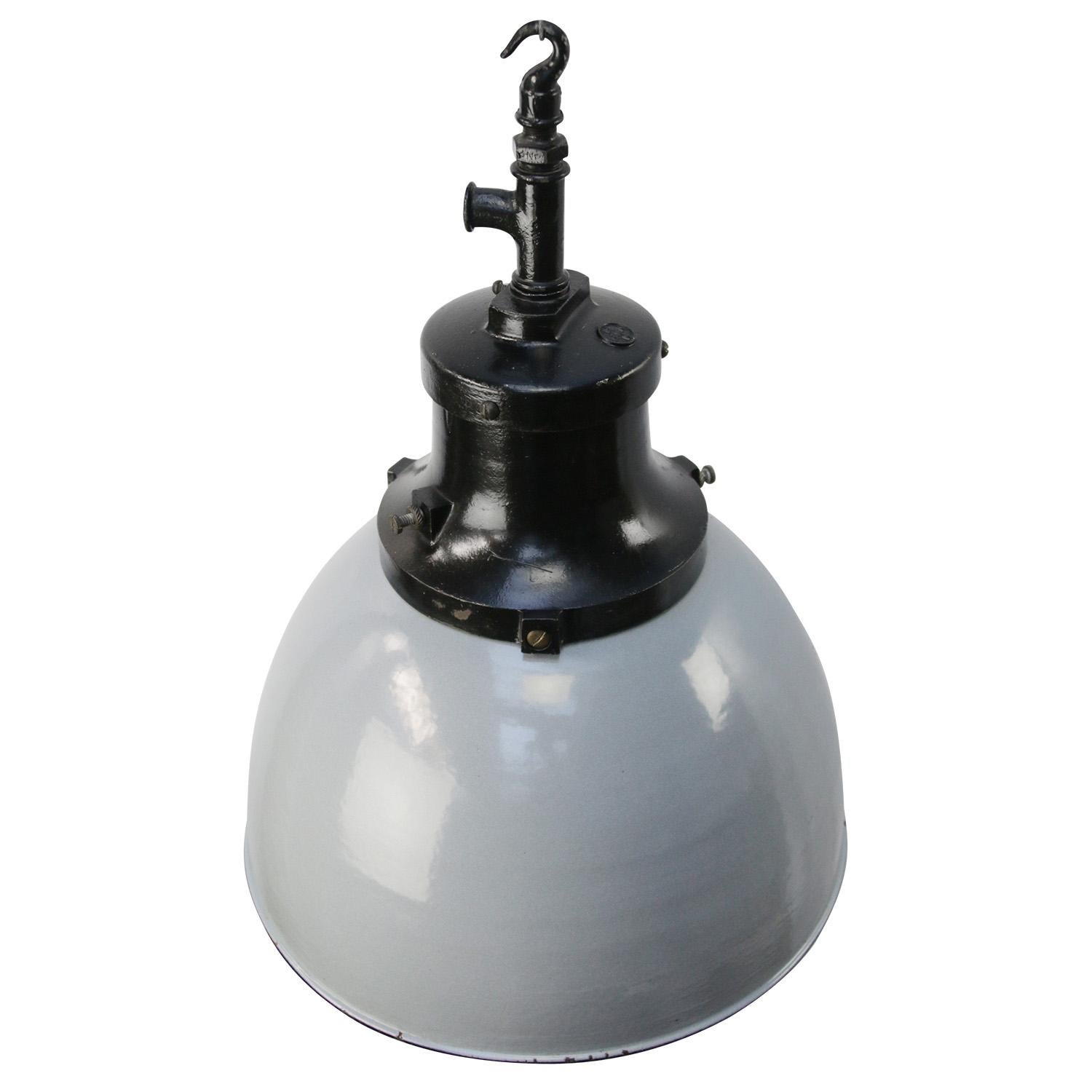 Rare and old factory lamp by HWK
Grey enamel with black cast iron top
White interior

Weight: 5.40 kg / 11.9 lb

Priced per individual item. All lamps have been made suitable by international standards for incandescent light bulbs,