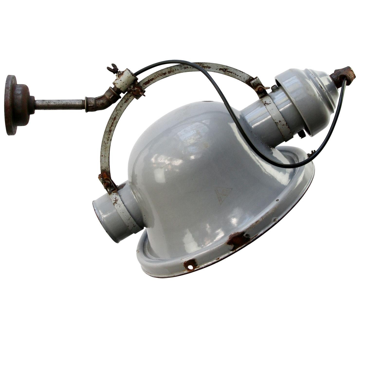 Large industrial wall light by Beseg Licht Germany
grey enamel, cast iron parts and wall piece

Weight: 4.00 kg / 8.8 lb

Priced per individual item. All lamps have been made suitable by international standards for incandescent light bulbs,