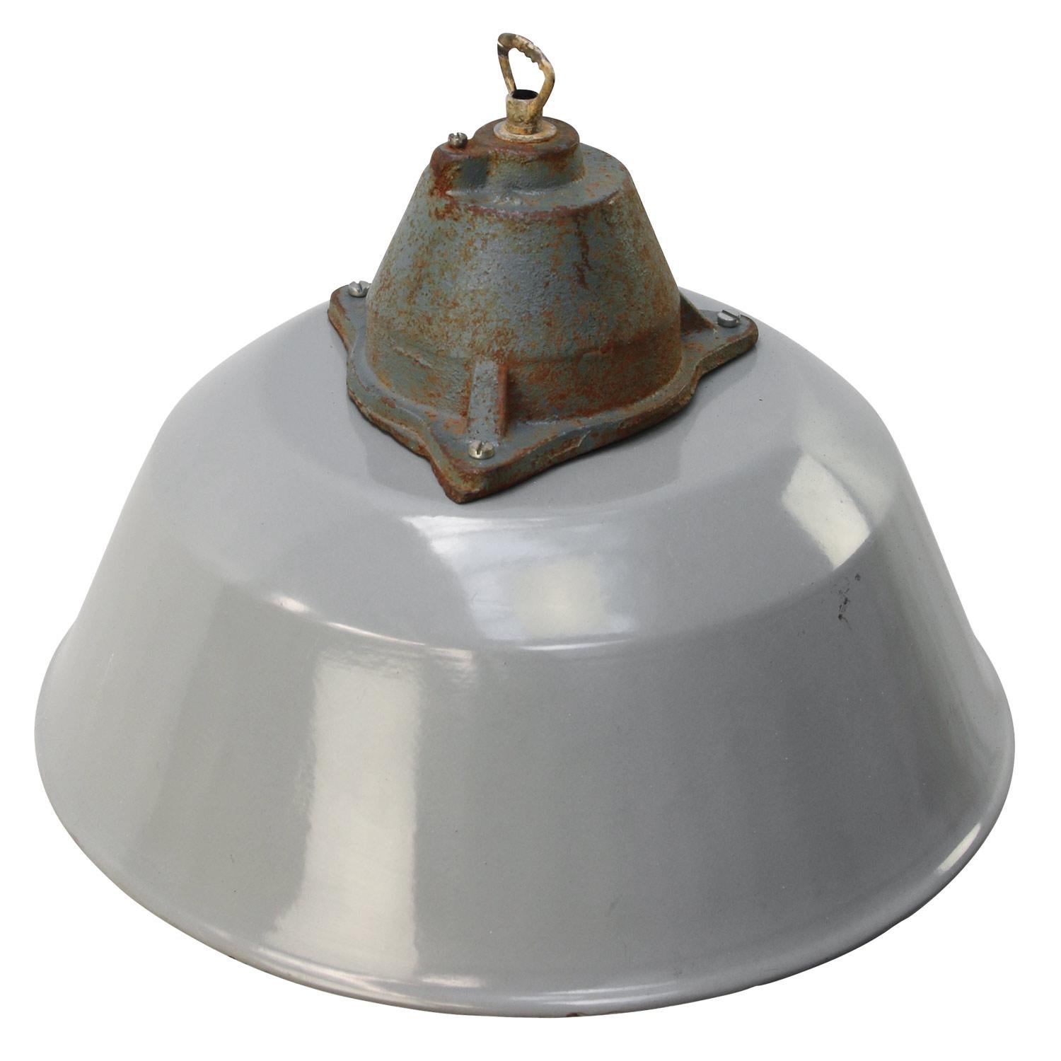 Factory pendant. Gray enamel white interior. Cast iron top with clear glass.

Measures: Weight 3.4 kg / 7.5 lb

Priced per individual item. All lamps have been made suitable by international standards for incandescent light bulbs,