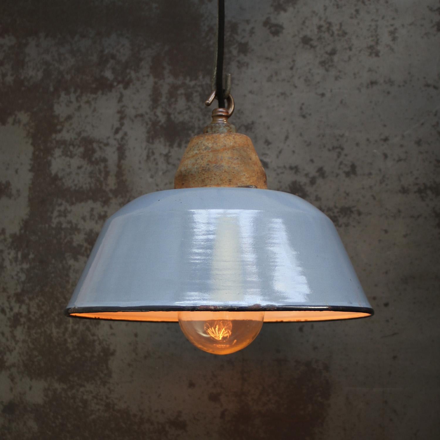 Factory pendant. Grey enamel, white interior. Cast iron top with clear glass.

Weight 3.4 kg / 7.5 lb

Priced per individual item. All lamps have been made suitable by international standards for incandescent light bulbs, energy-efficient and LED