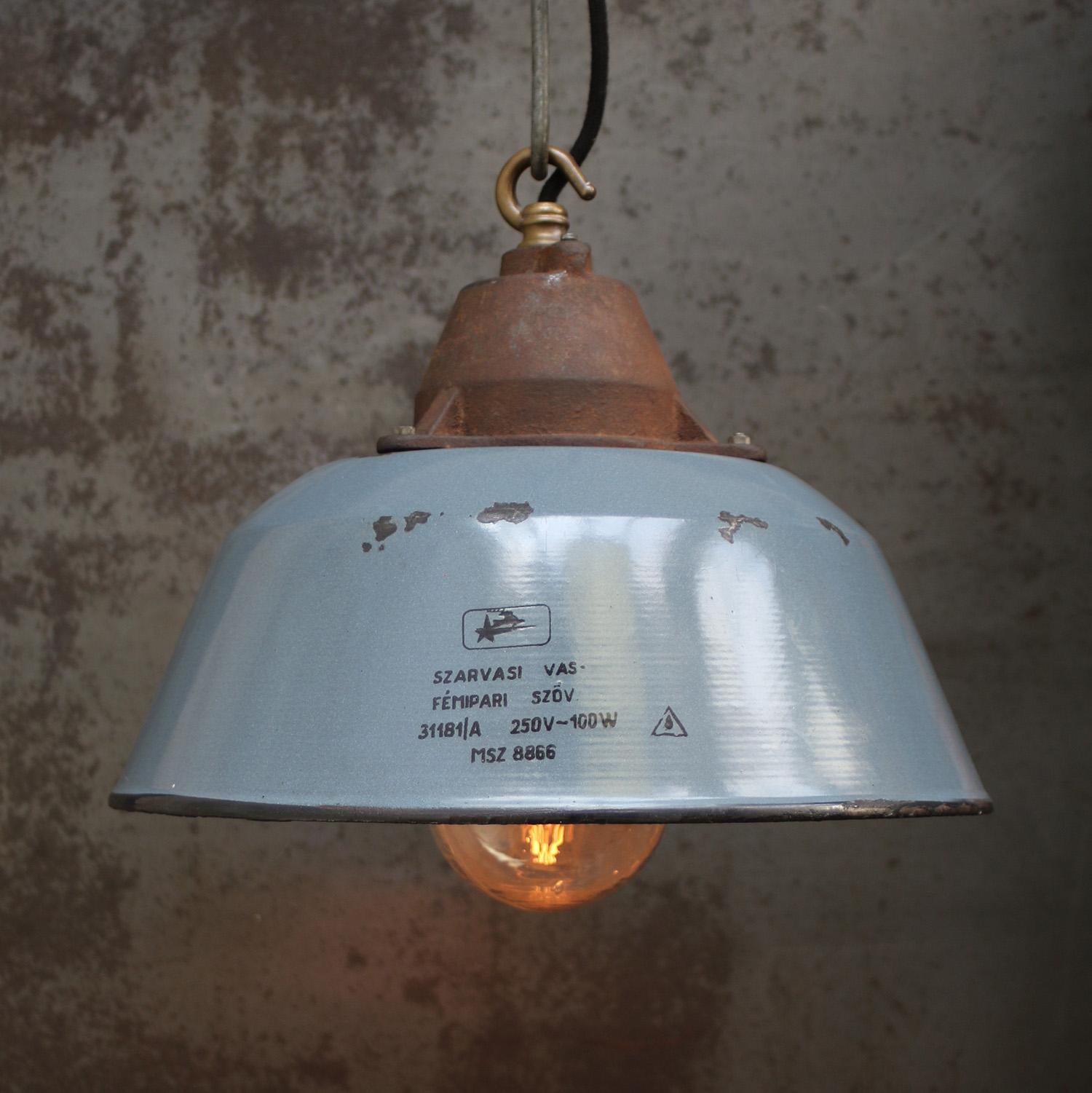 Factory pendant. Black enamel, white interior. Cast iron top with clear glass.

Weight 3.4 kg / 7.5 lb

Priced per individual item. All lamps have been made suitable by international standards for incandescent light bulbs, energy-efficient and LED