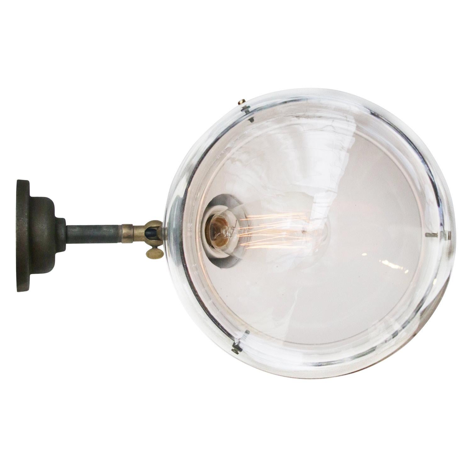 Vintage industrial wall light with round clear glass
Gray enamel, cast iron parts and wall base

Diameter wall mount 10.5 cm / 4”.

Weight: 2.00 kg / 4.4 lb.

Priced per individual item. All lamps have been made suitable by international standards