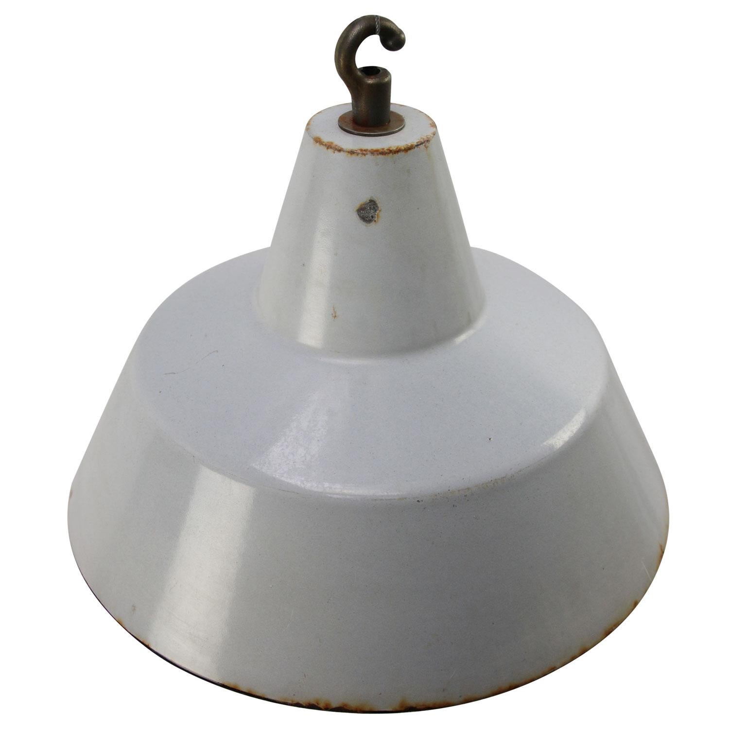 Dutch industrial hanging lamp by Philips
grey enamel white interior

Weight: 1.25 kg / 2.8 lb

Priced per individual item. All lamps have been made suitable by international standards for incandescent light bulbs, energy-efficient and LED