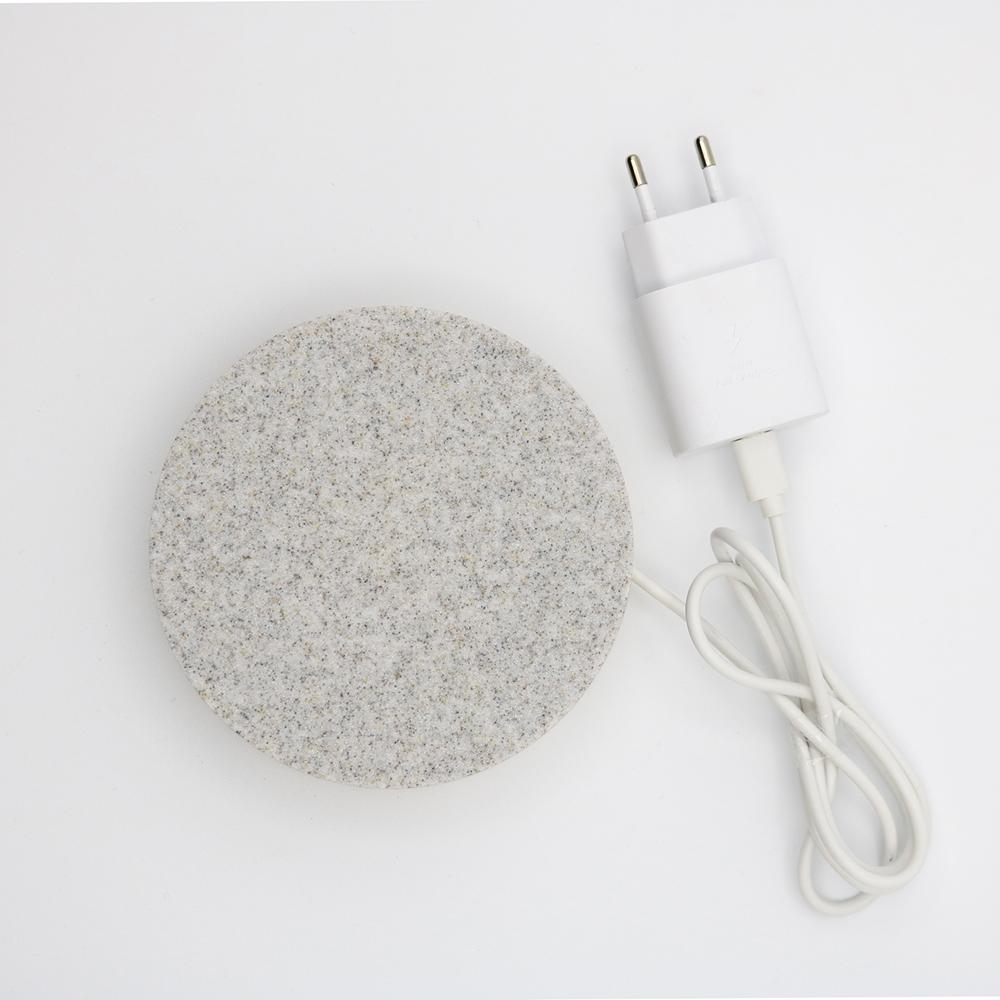 A corian base,
that quickly charges your phone, with a touch of magic.
 
A circle, 
a corian, 
realized with the care that marble requires.

A powerful wireless charging technology ensures an efficient and reliable power delivery.

The result is a