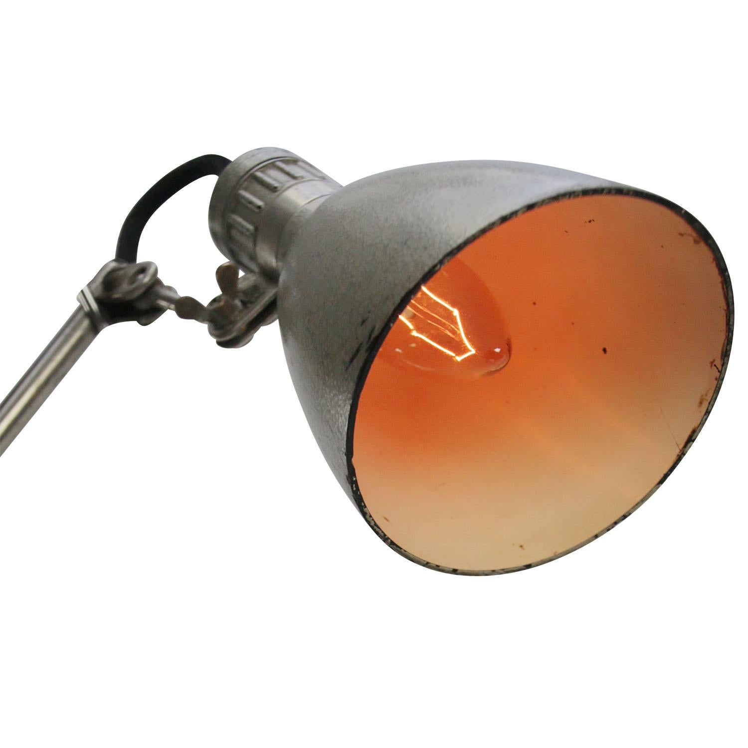 Industrial work light with Bakelite shade by Lumina, France
Including plug and switch in shade

Weight: 1.10 kg / 2.4 lb

E14 screw bulb size

Priced per individual item. All lamps have been made suitable by international standards for